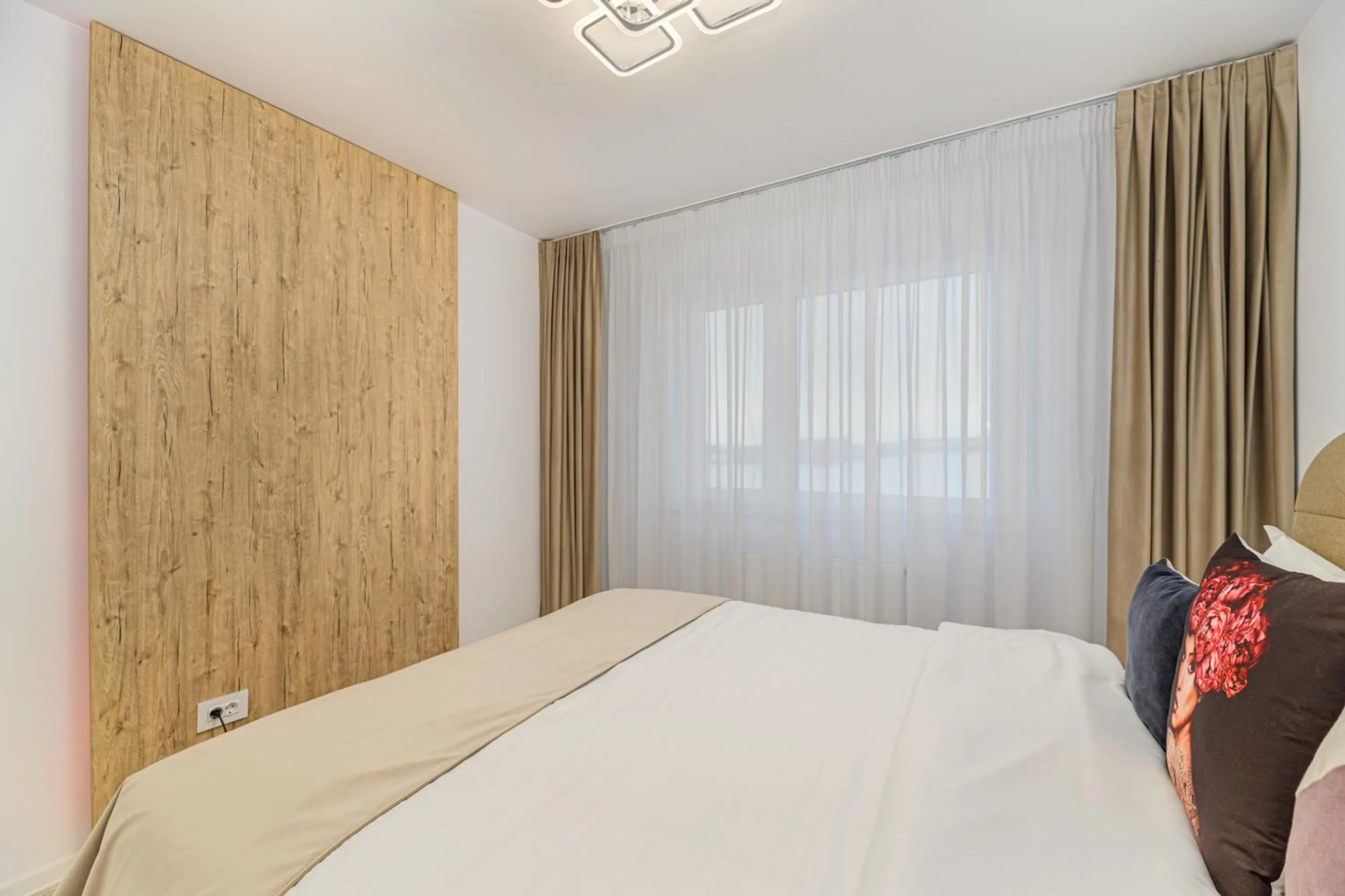 Bed in MK Apartments Brasov
