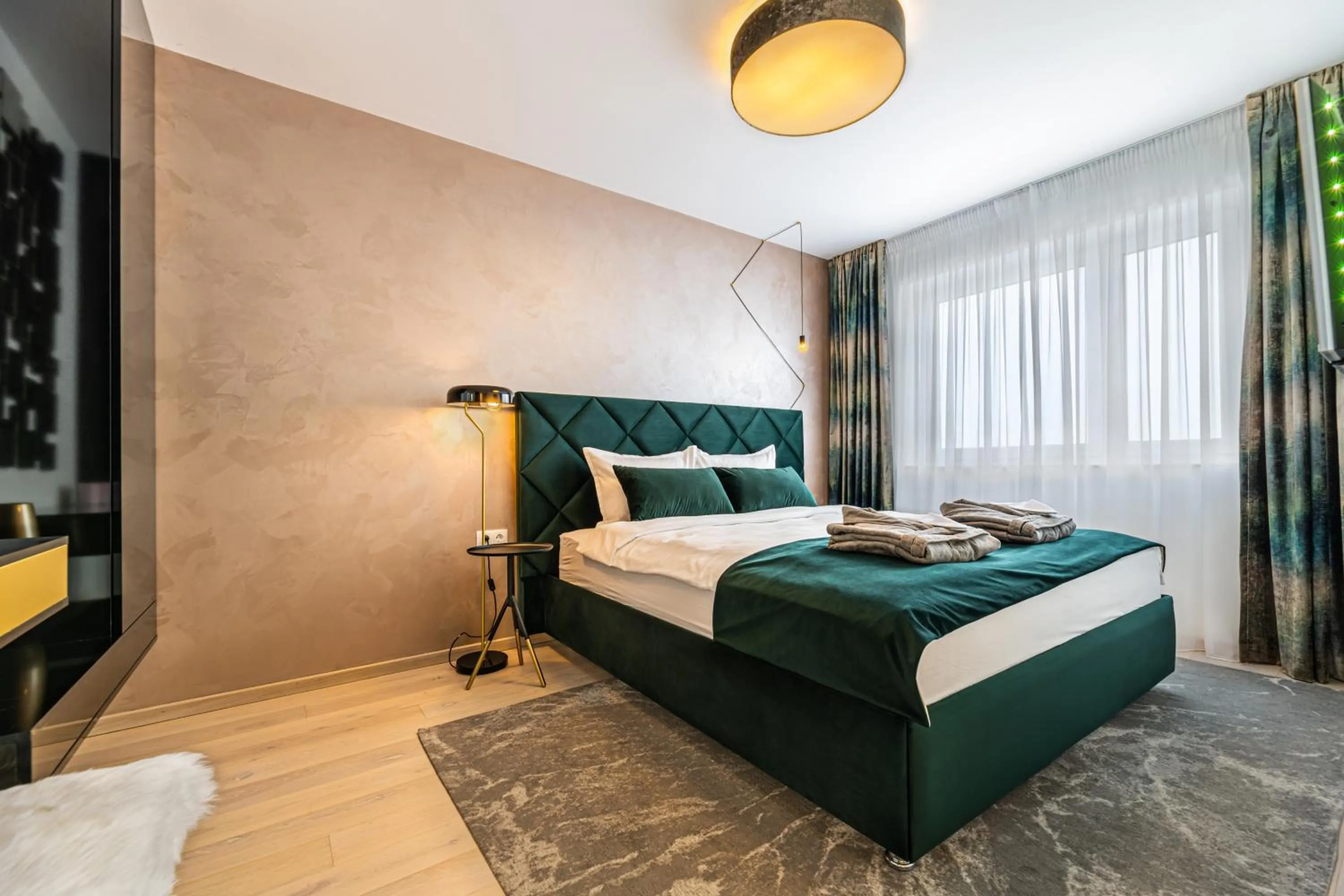 Bed in MK Apartments Brasov