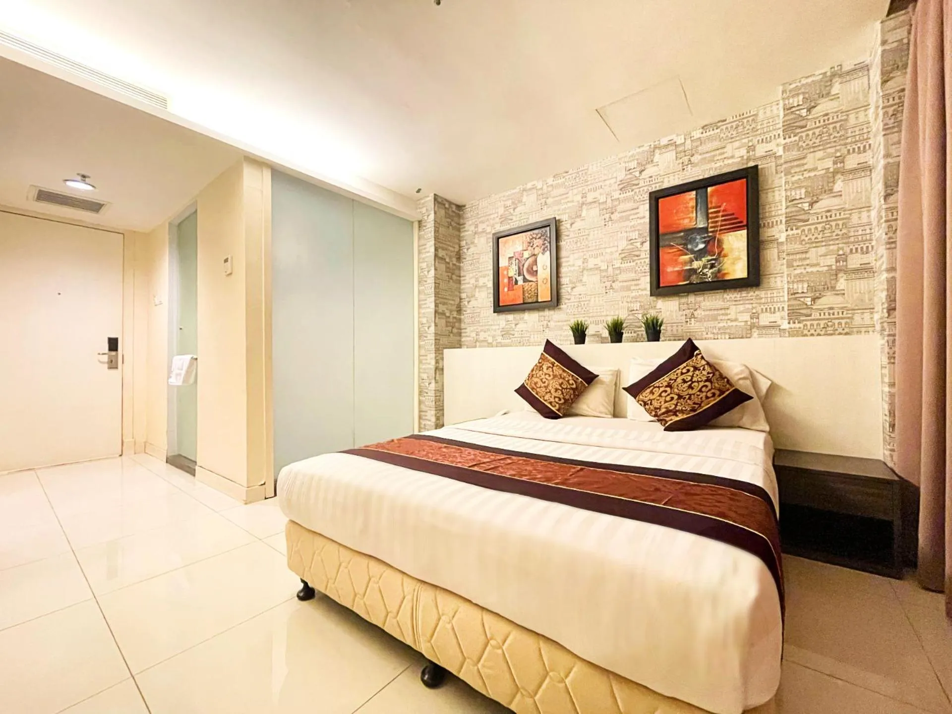 Bedroom in ESQ Shamelin Hotel