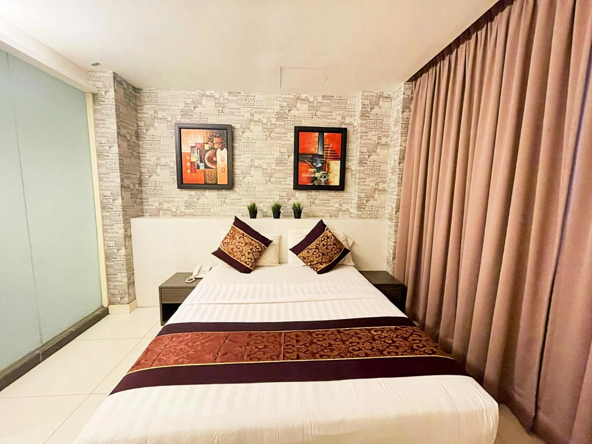 Bedroom in ESQ Shamelin Hotel