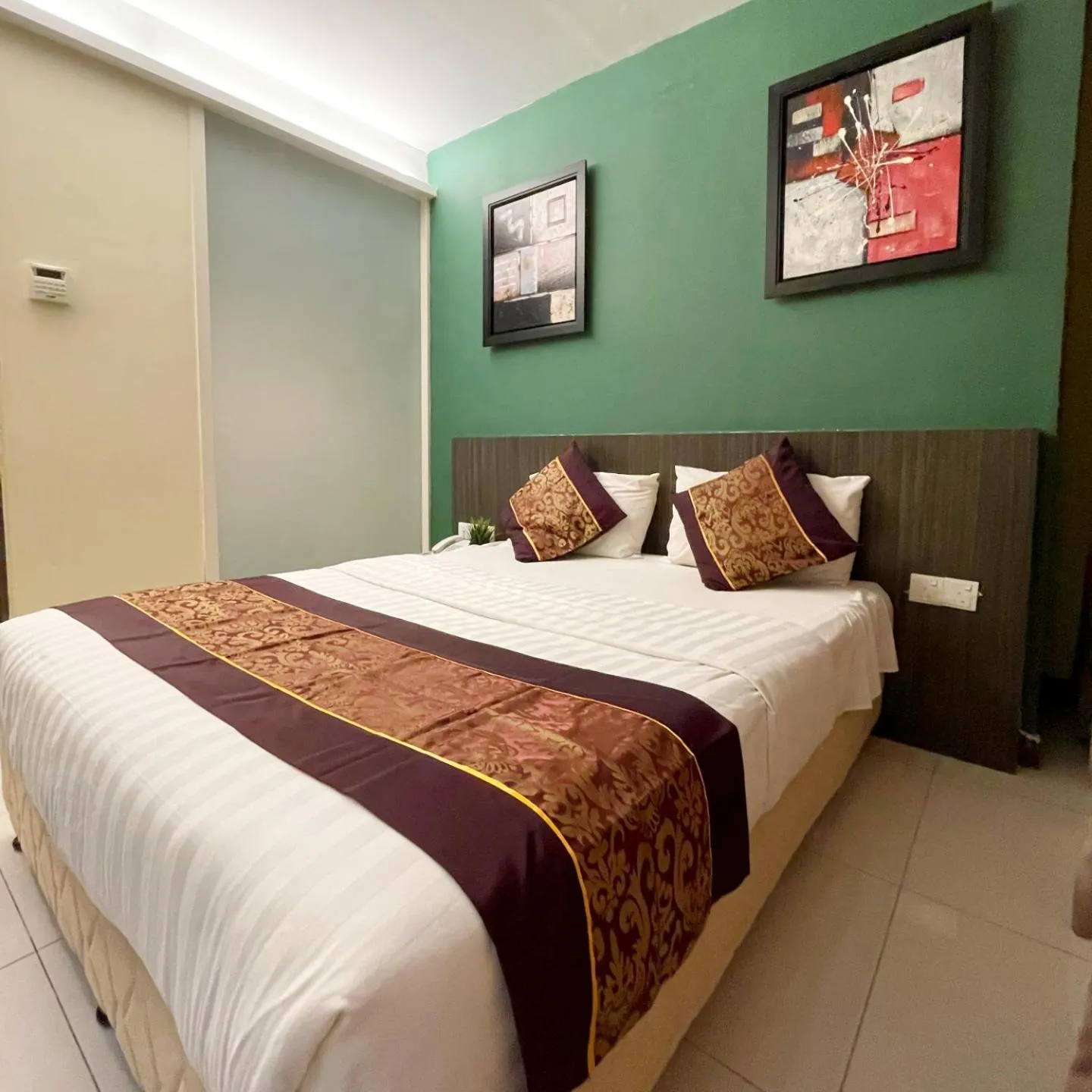 Bedroom in ESQ Shamelin Hotel