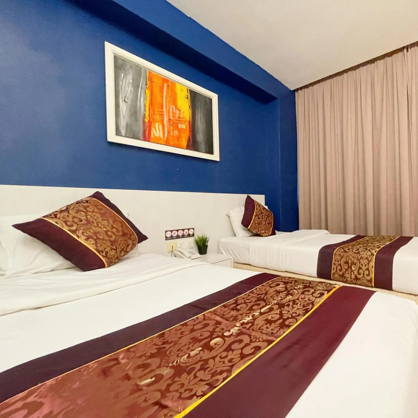 Bedroom in ESQ Shamelin Hotel