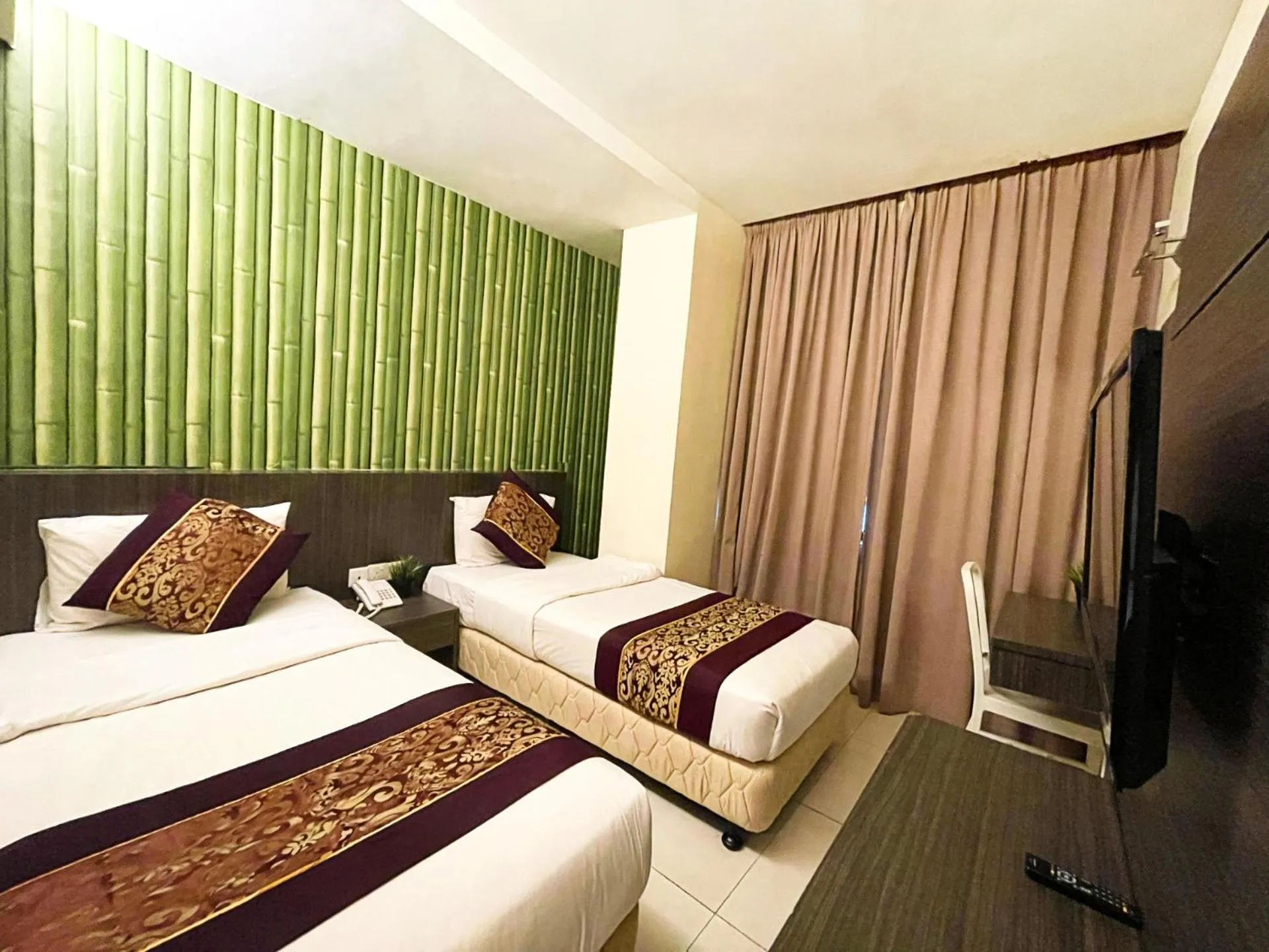 Bedroom in ESQ Shamelin Hotel