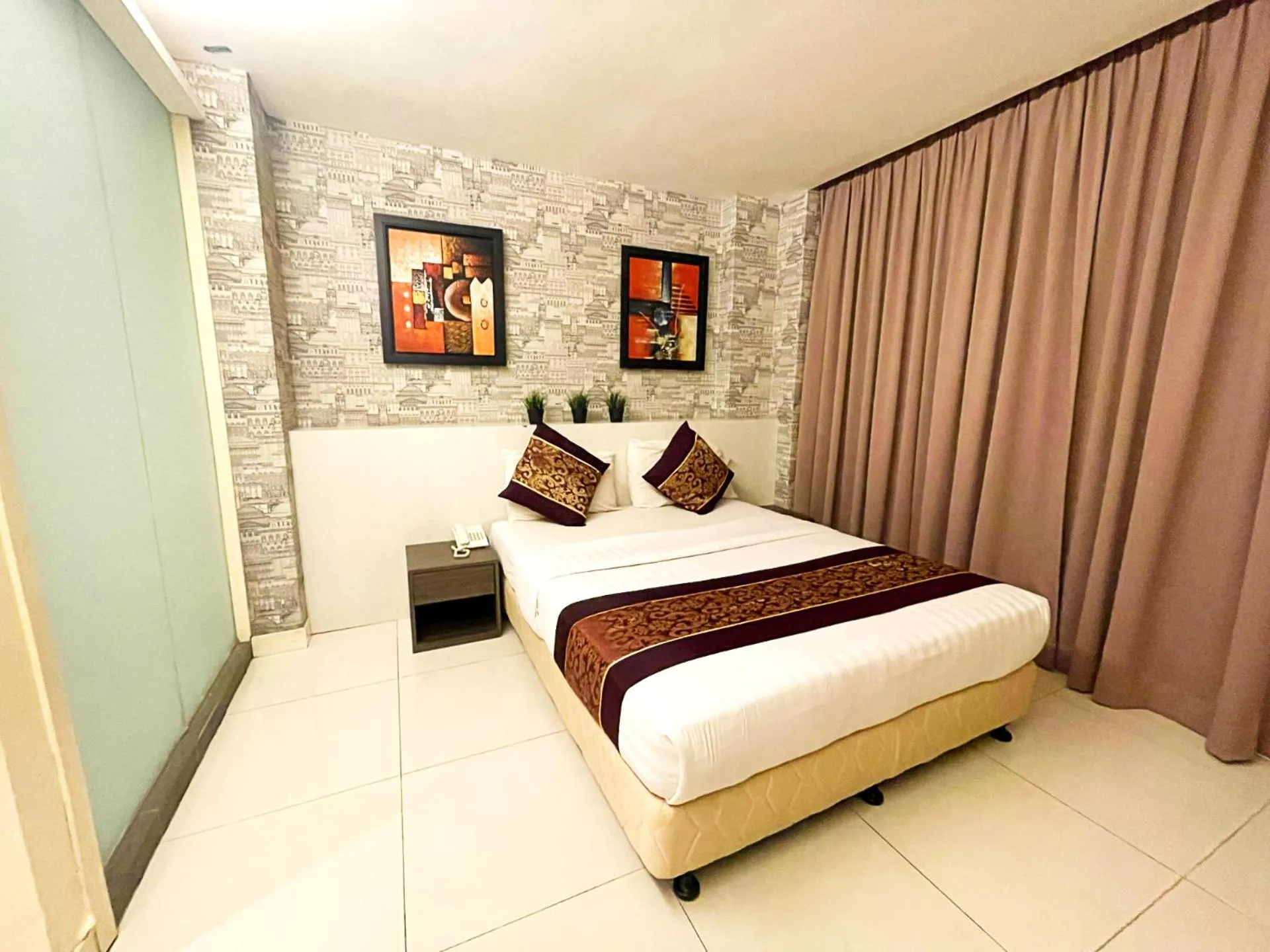 Bedroom in ESQ Shamelin Hotel