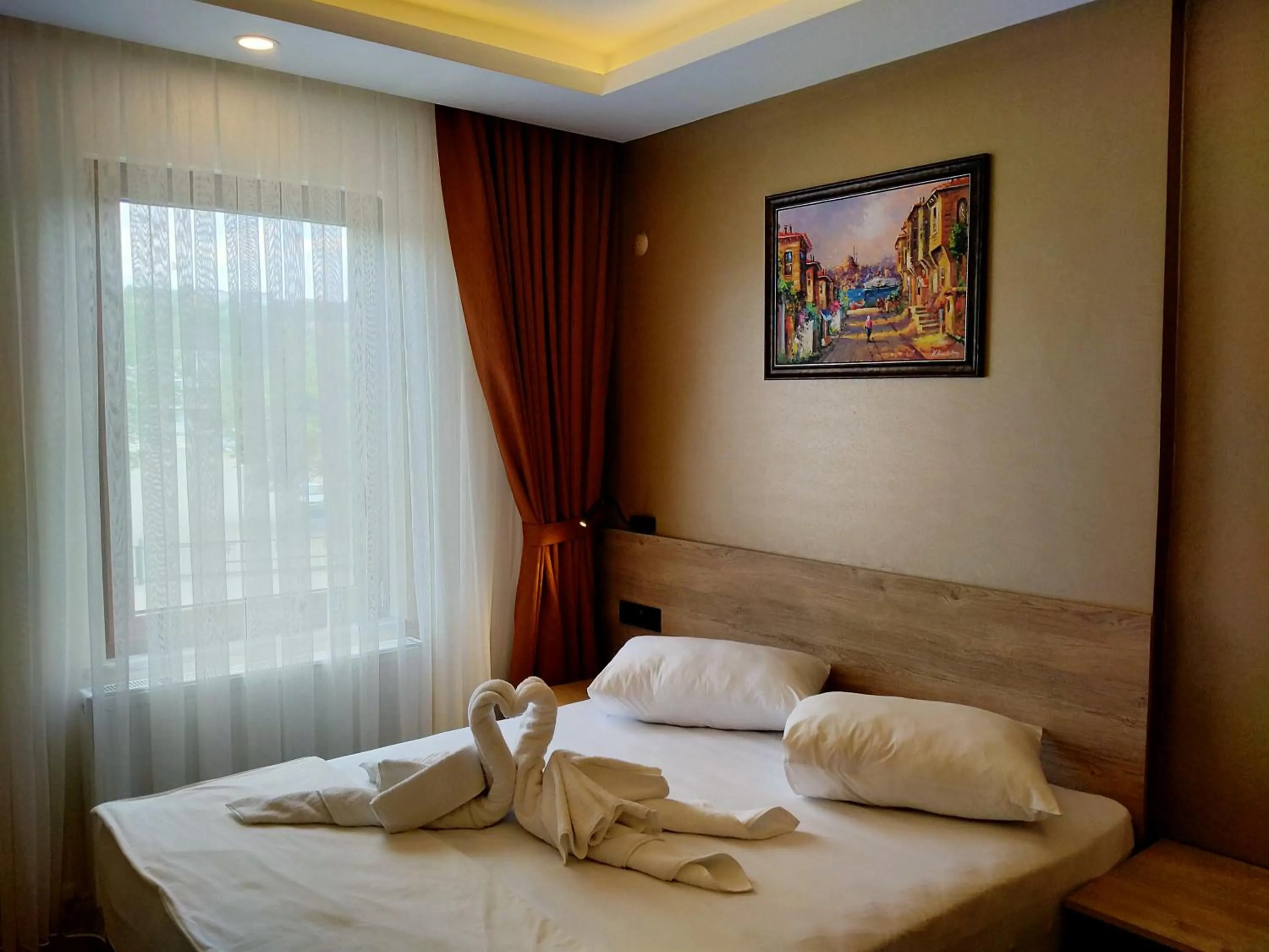 Bed in Palmiye Royale Palace