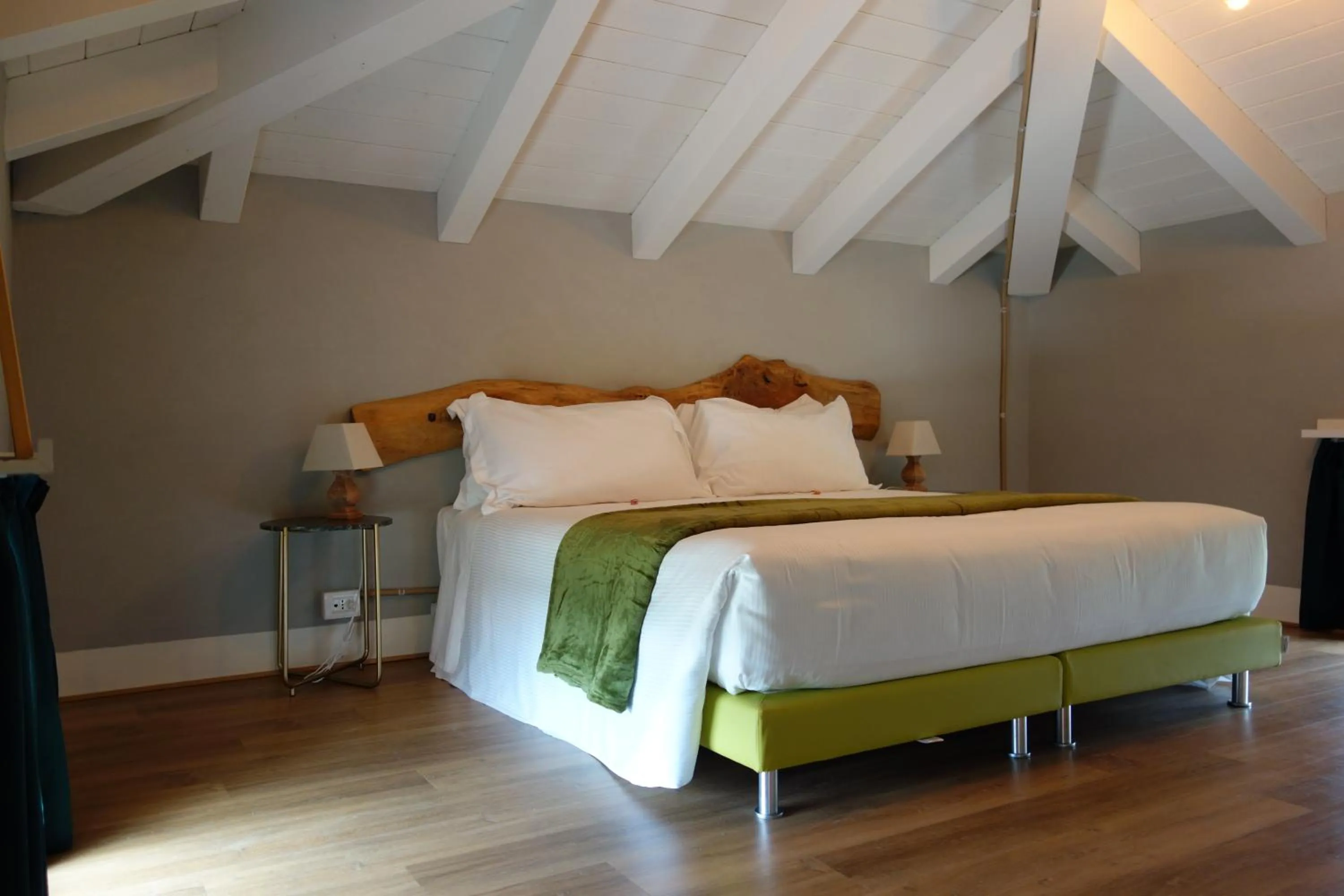 Bed in Capriccio Art Hotel