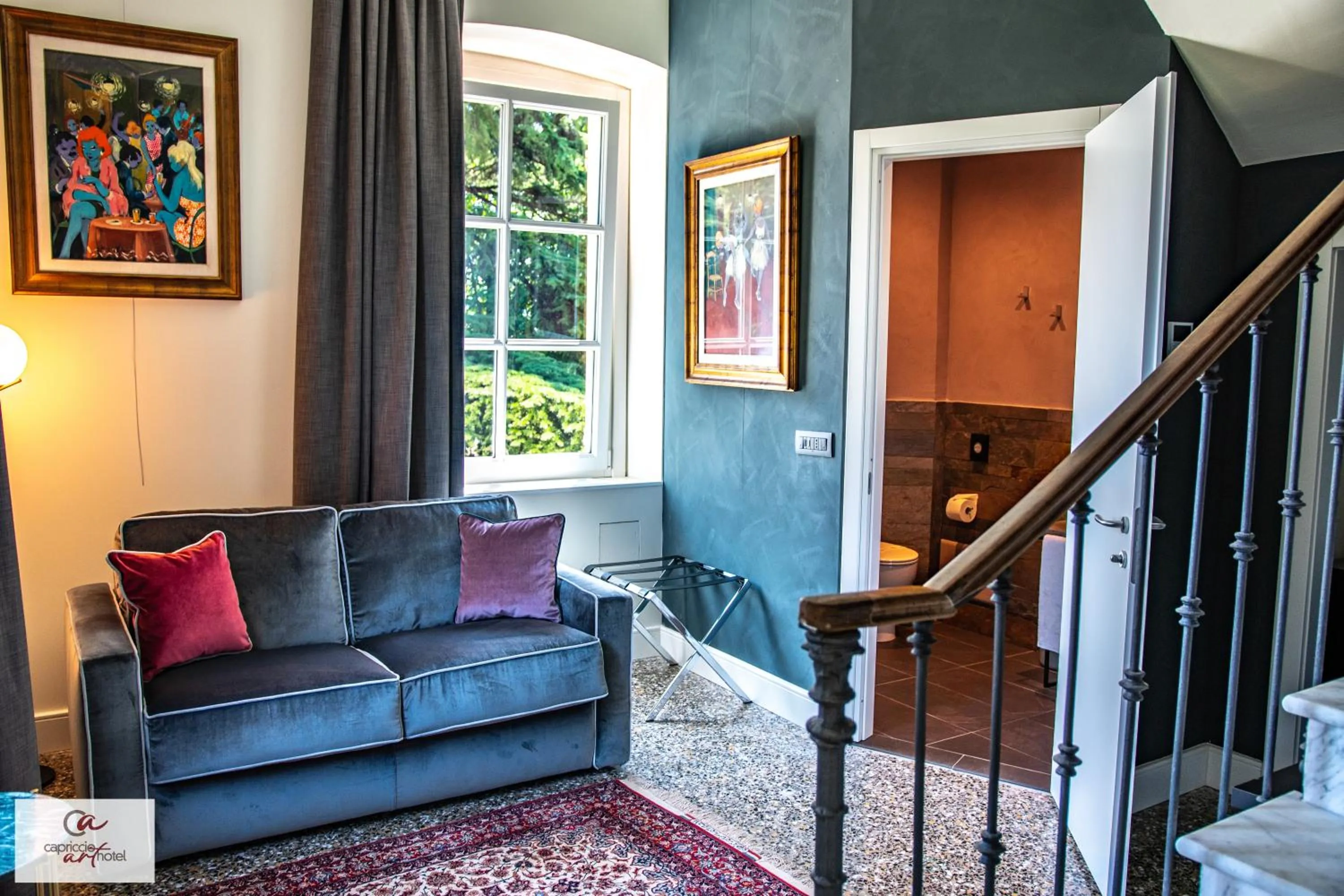 Living room in Capriccio Art Hotel