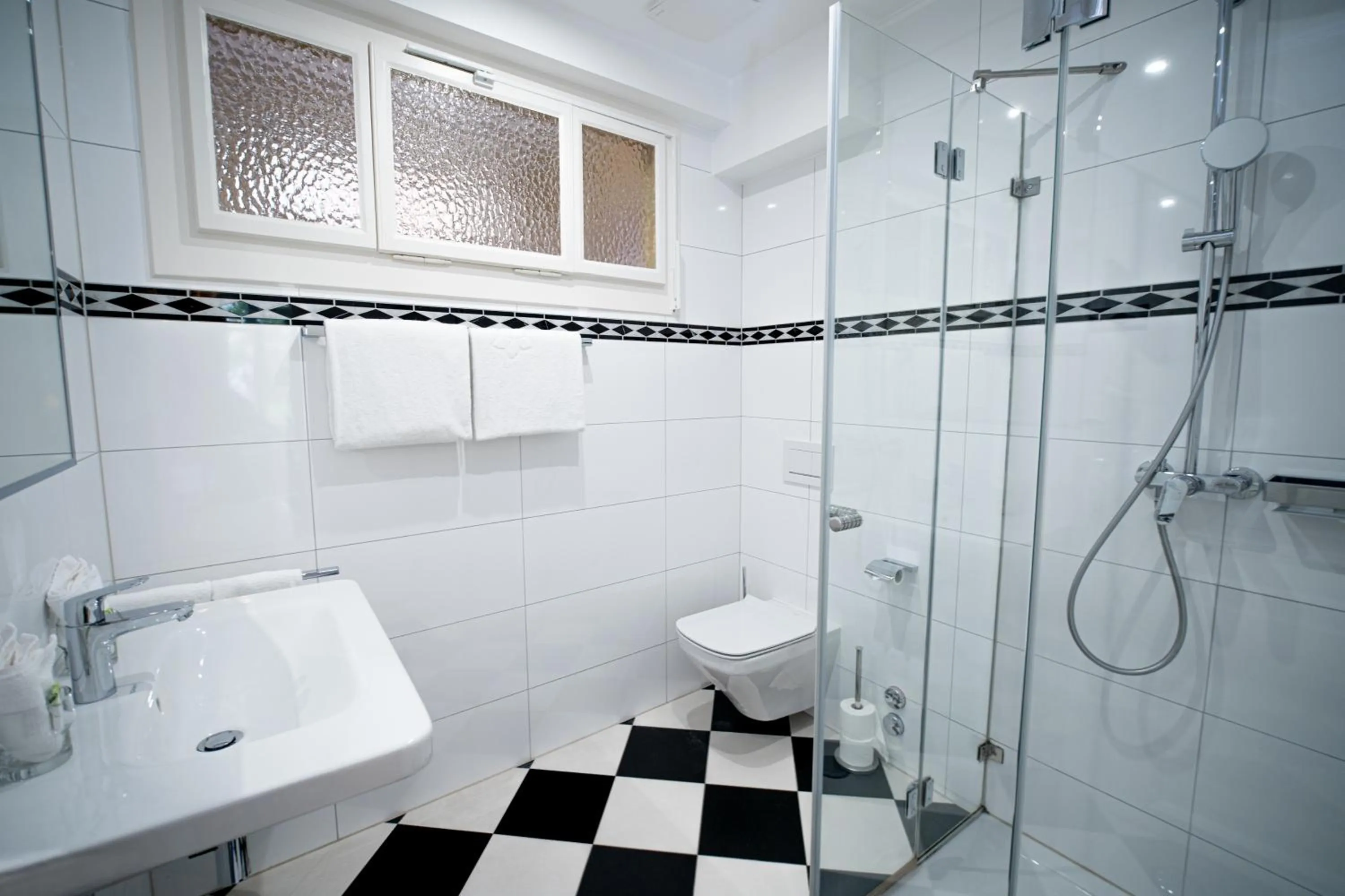 Bathroom in J5 Hotels Helvetie & La Brasserie