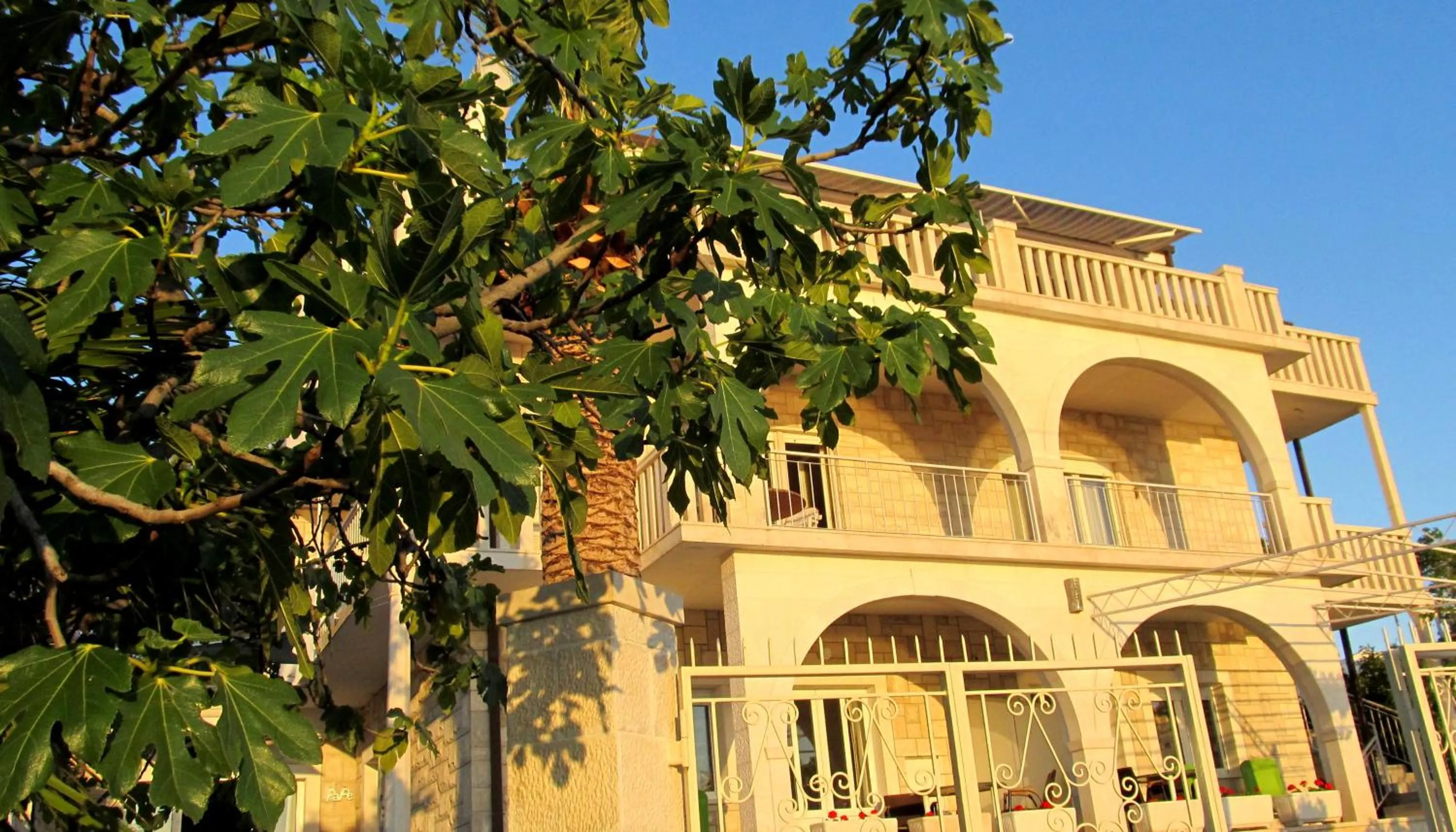 Property building in Beautiful apartment for two persons with sea view in Trogir near the beach