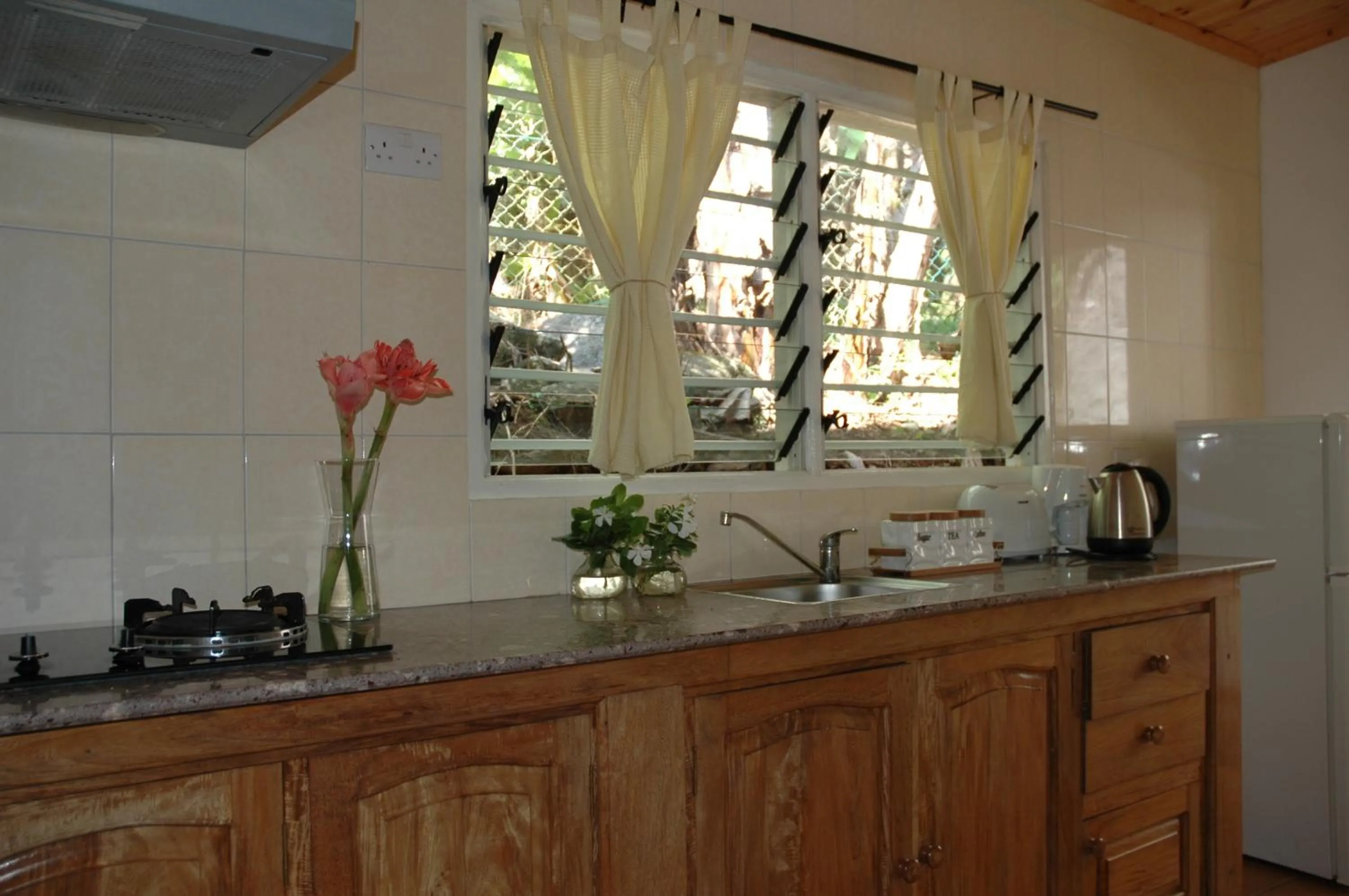 Kitchen or kitchenette in Kokogrove Chalets