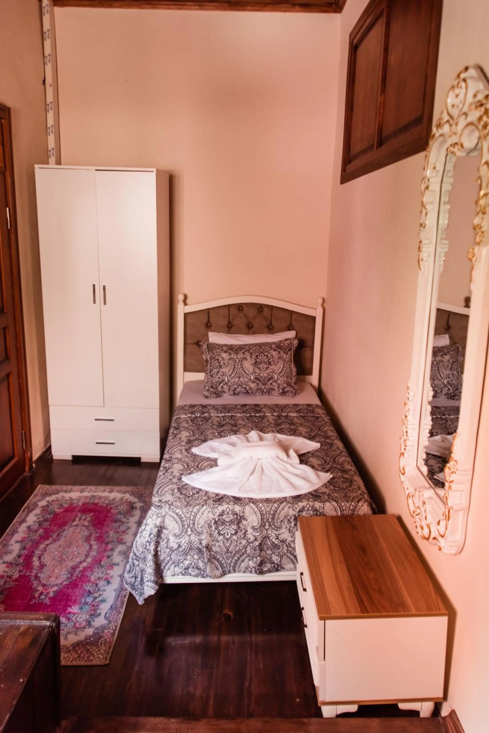 Bed in Lily Town Hotel