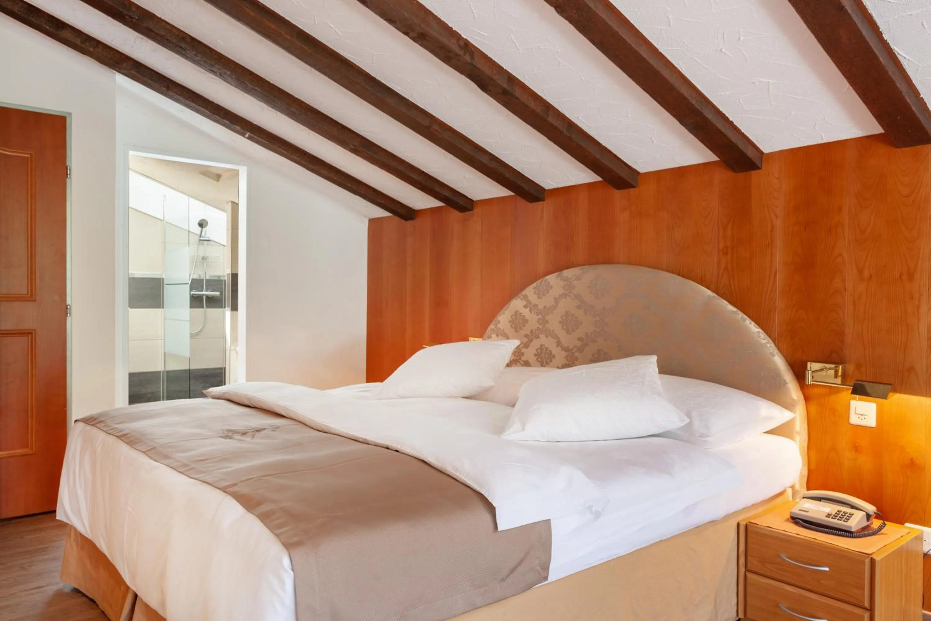 Bed in Hotel Beau Rivage