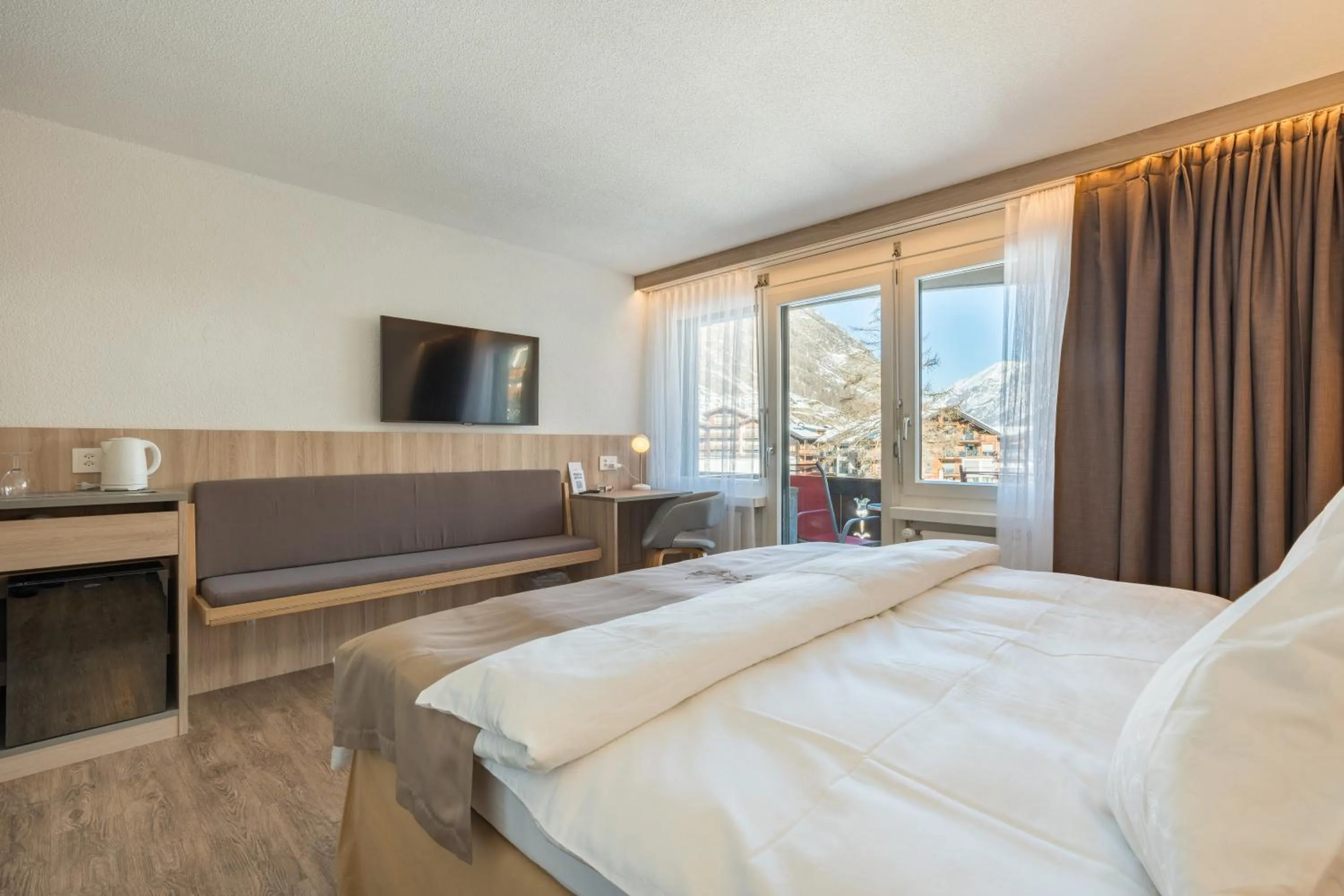 Bed in Hotel Beau Rivage