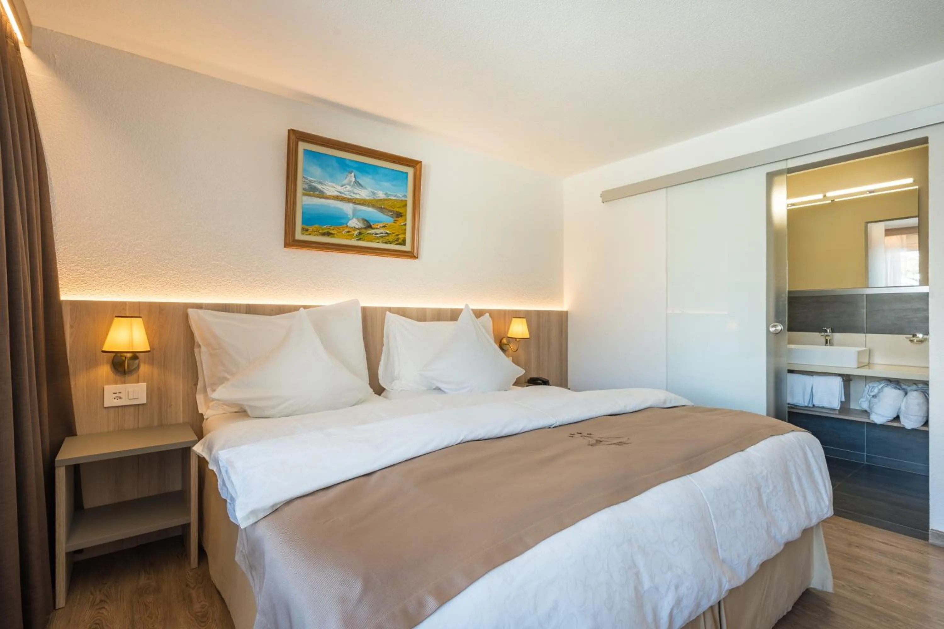 Bed in Hotel Beau Rivage