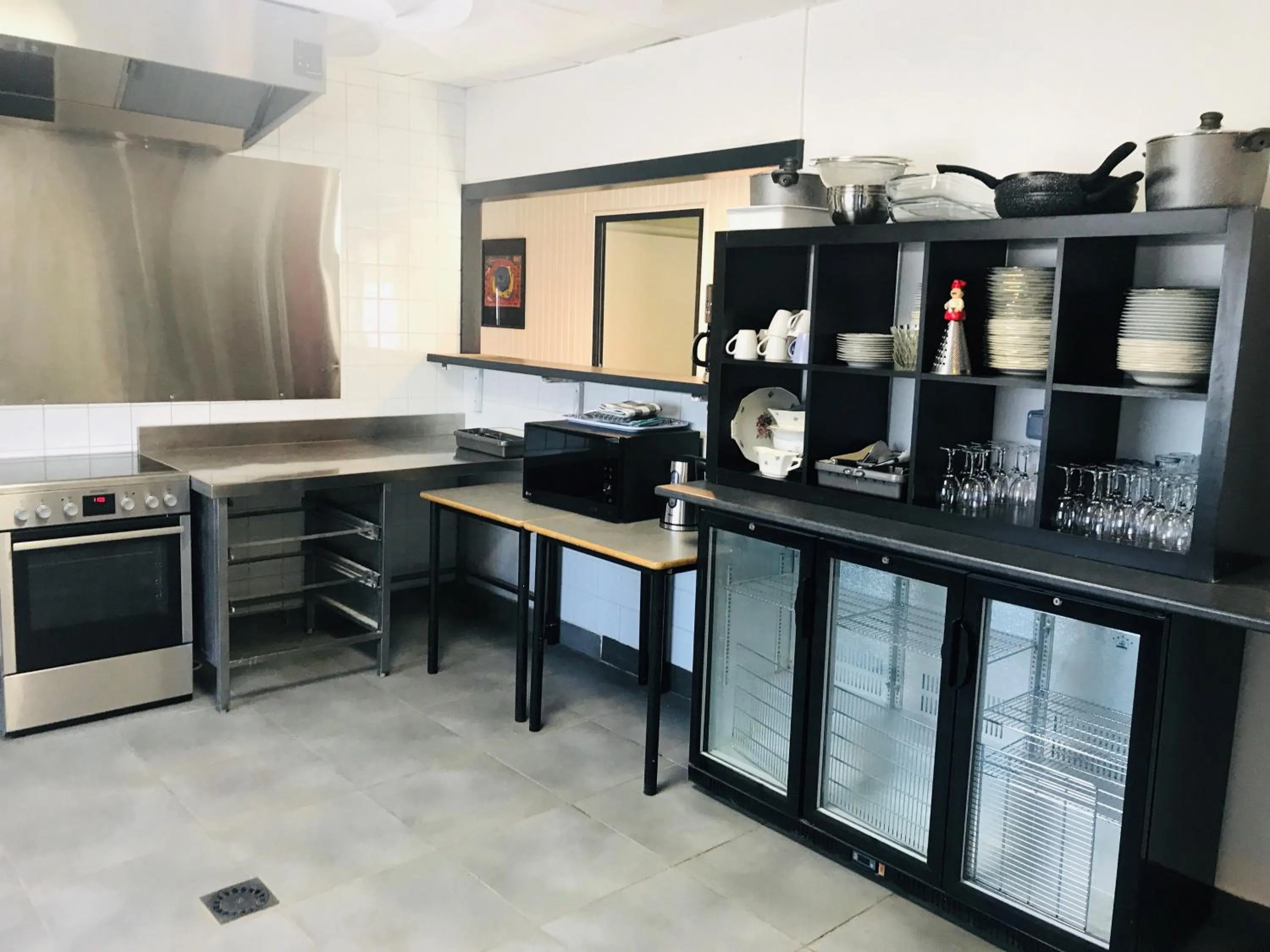 Kitchen or kitchenette in Hebergements le Camp d'Auneau - Le Clos du Camp