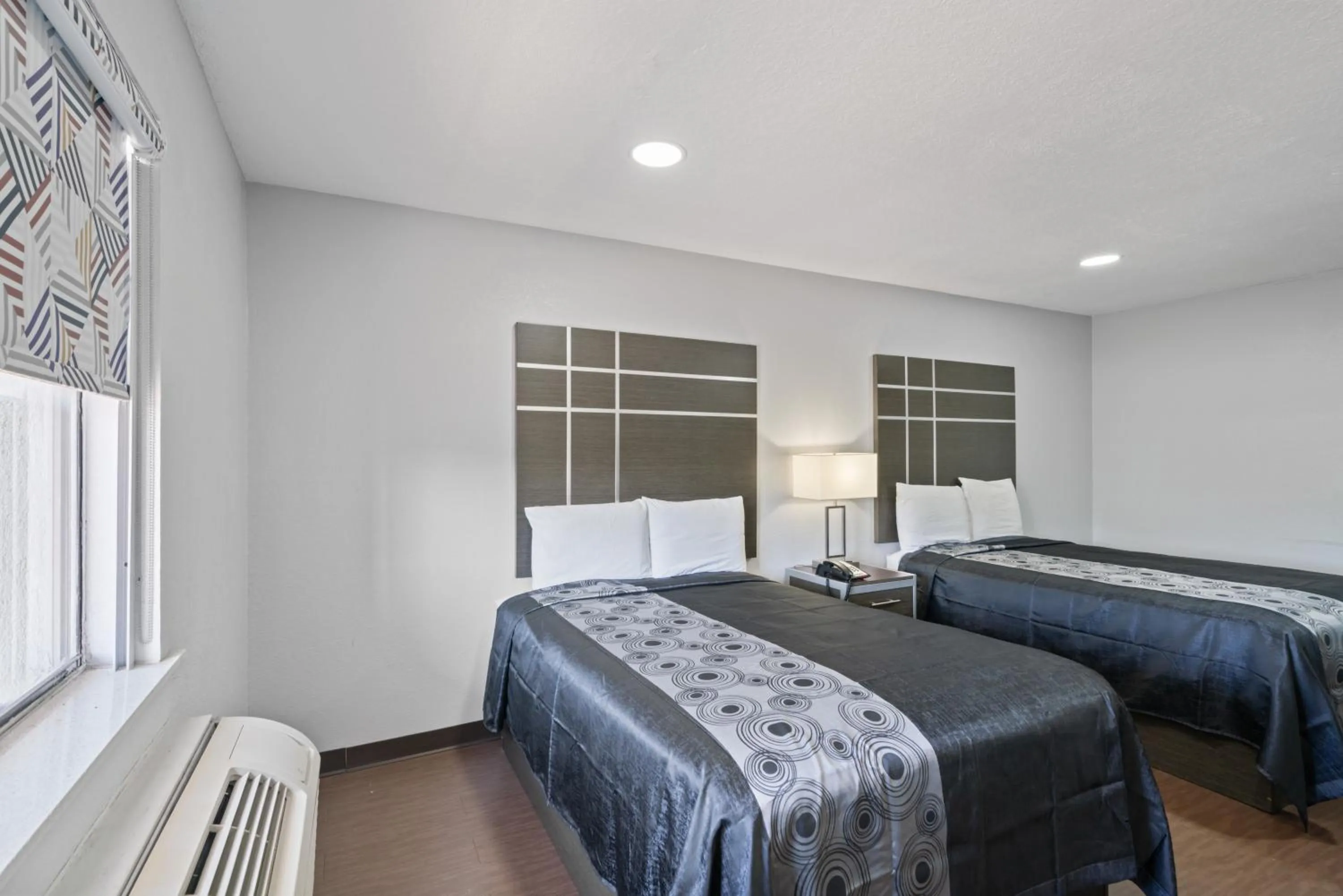 Bed in Americas Best Value Inn & Suites Brenham