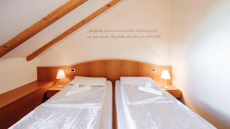 Bed in Hotel Corno Bianco