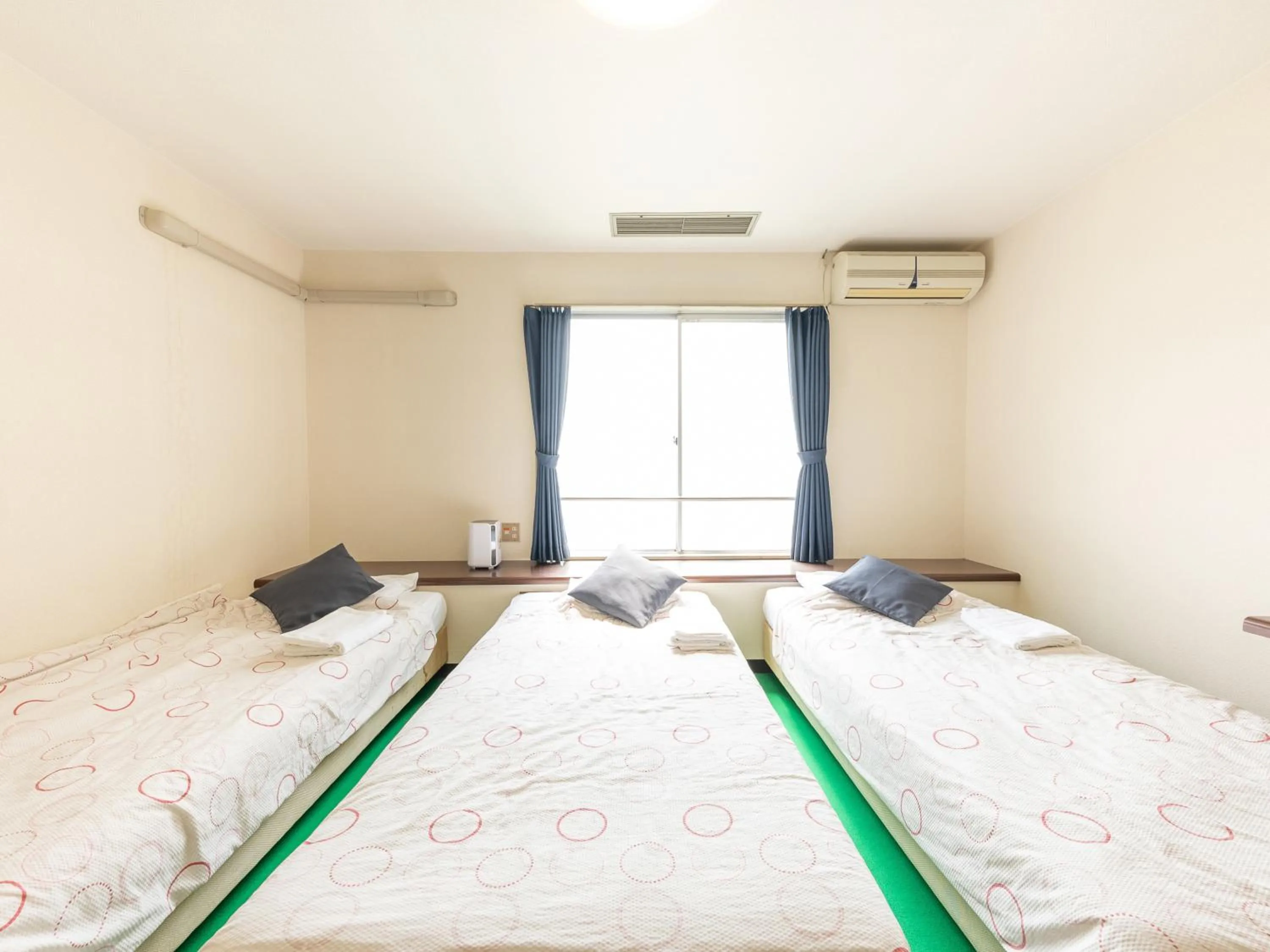 Bed in Tabist Business Hotel Chitose Kashiwazaki