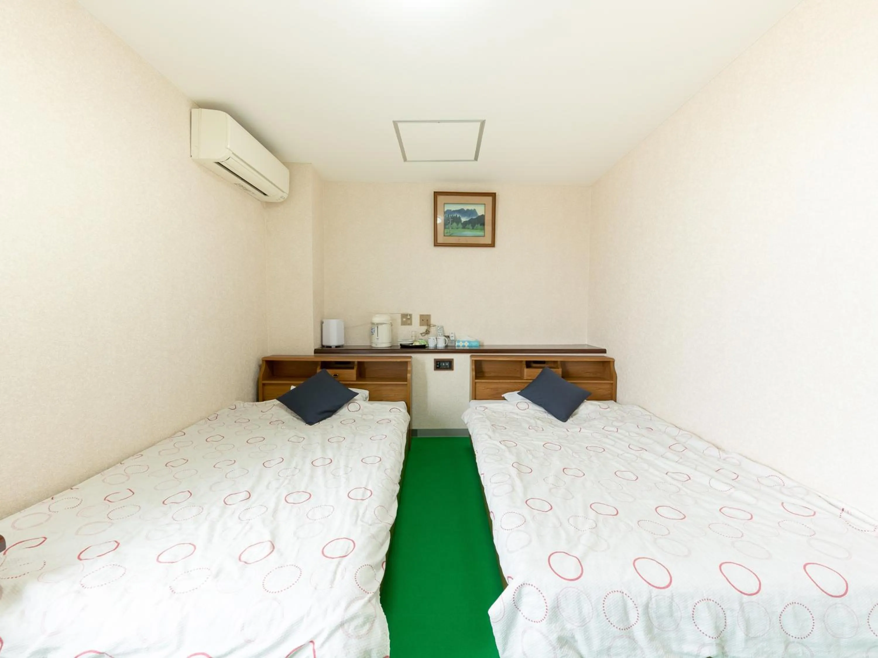 Bed in Tabist Business Hotel Chitose Kashiwazaki