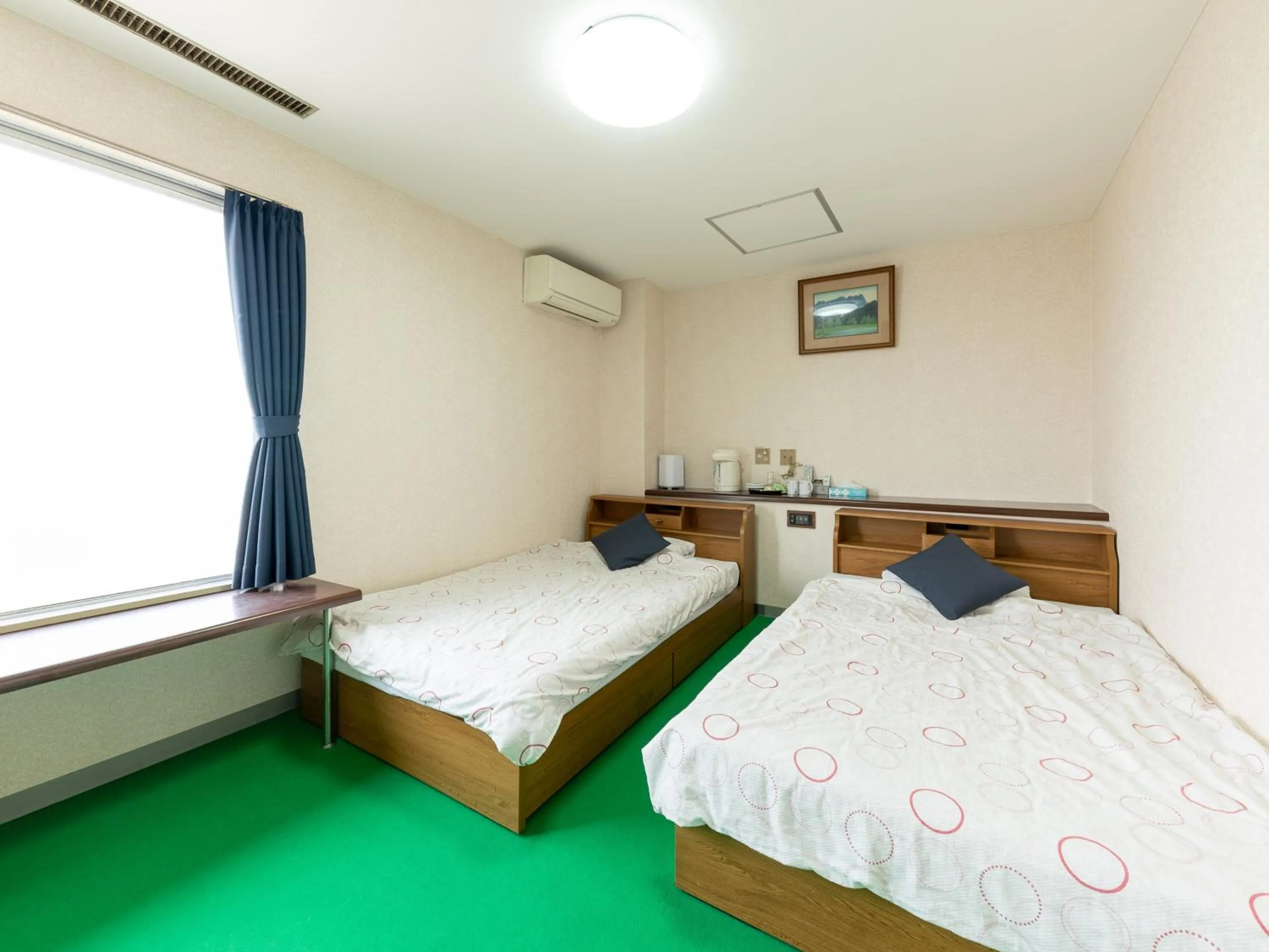 Bed in Tabist Business Hotel Chitose Kashiwazaki