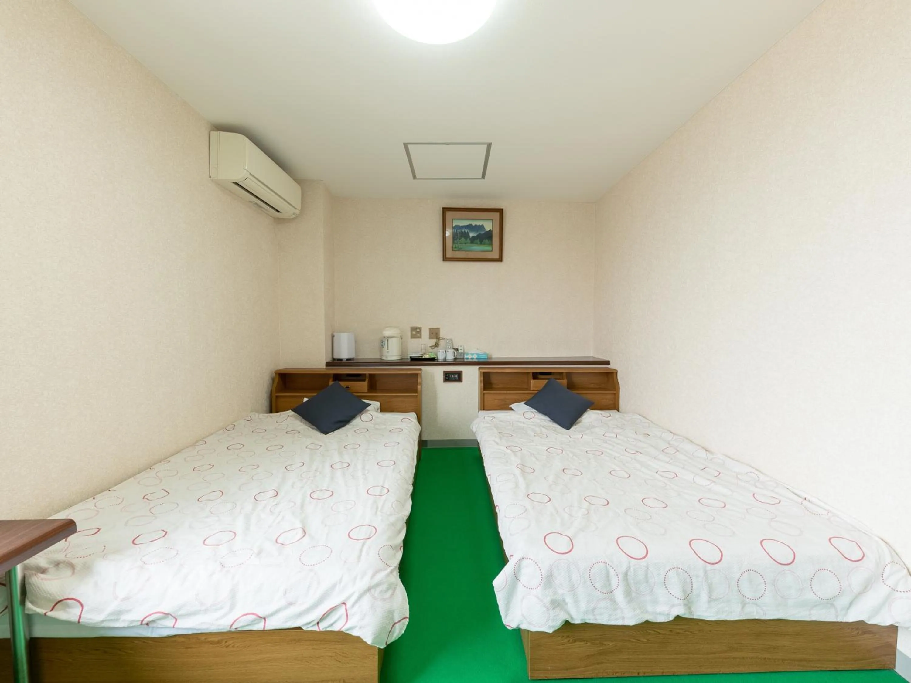 Bed in Tabist Business Hotel Chitose Kashiwazaki