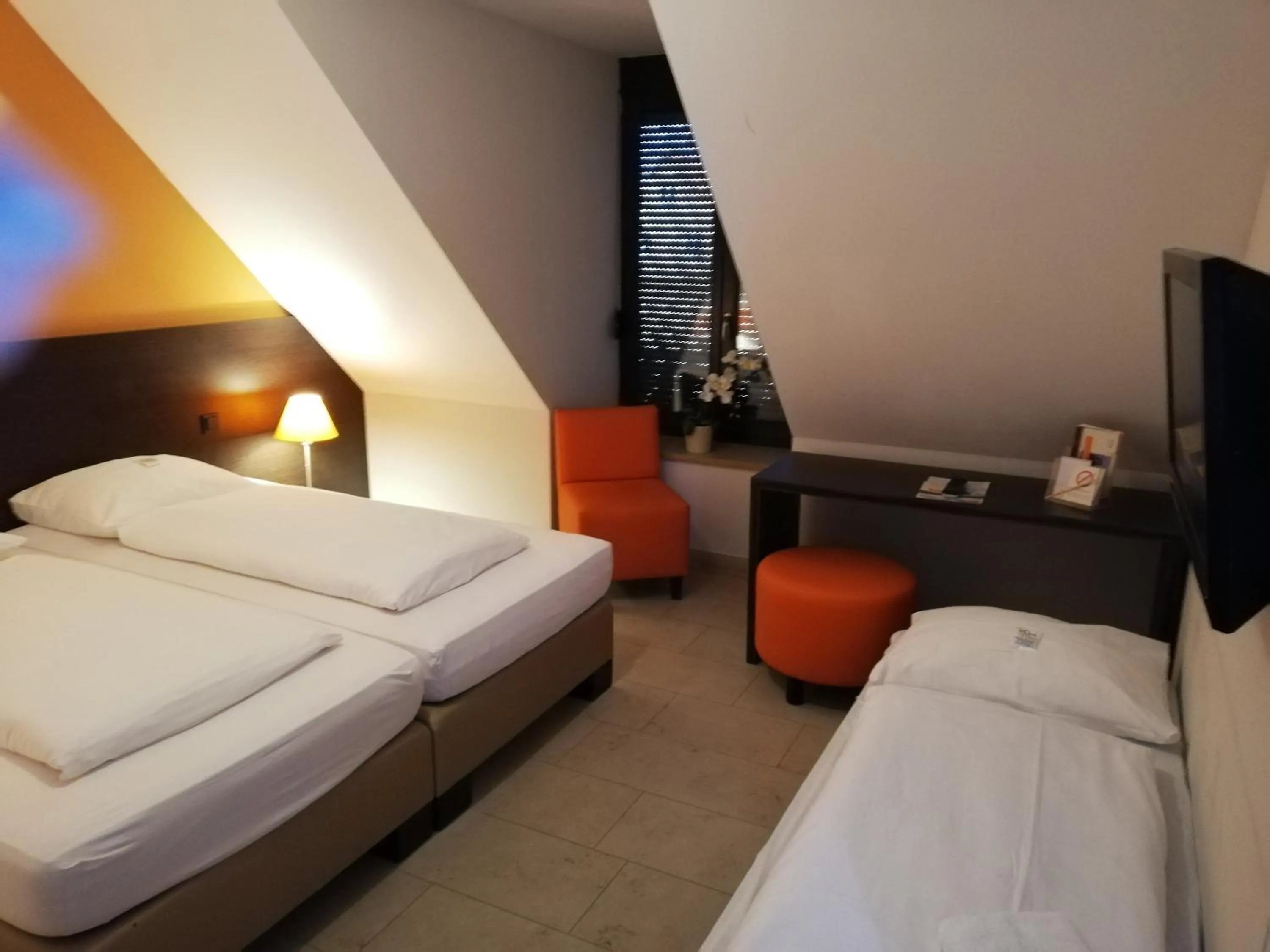 Photo of the whole room, Bed in KH Hotel mit Restaurant