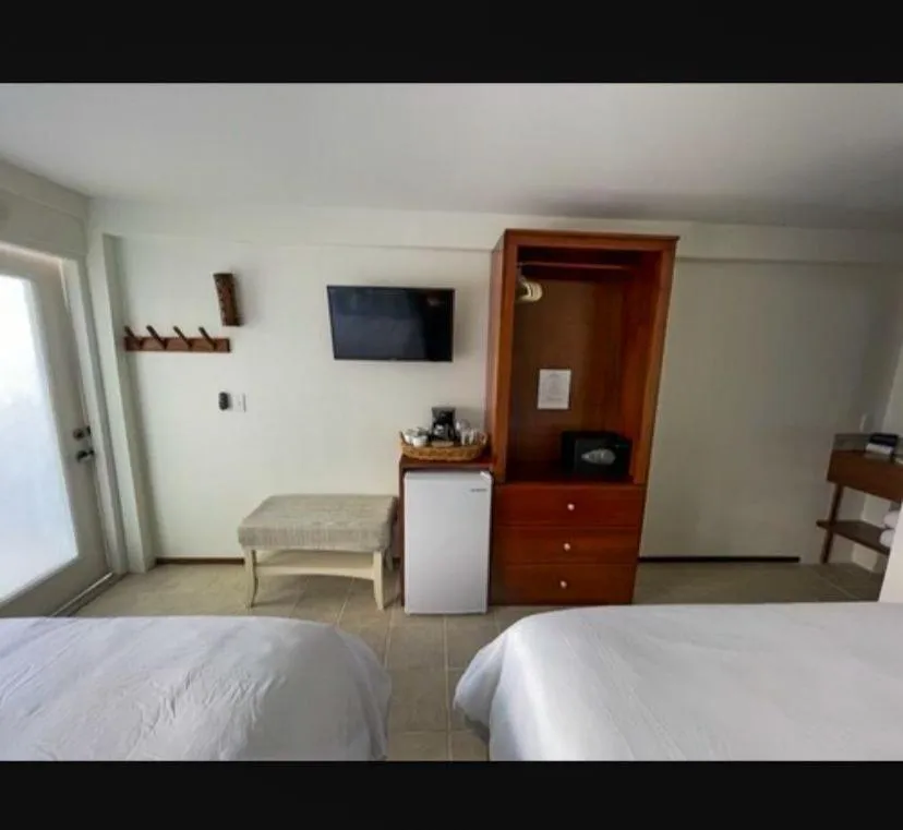 Bed in Mata Rocks Resort