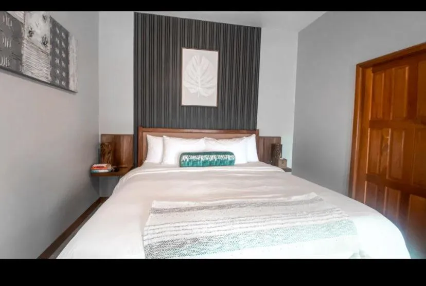 Bed in Mata Rocks Resort