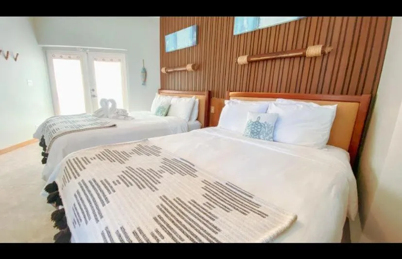 Bed in Mata Rocks Resort