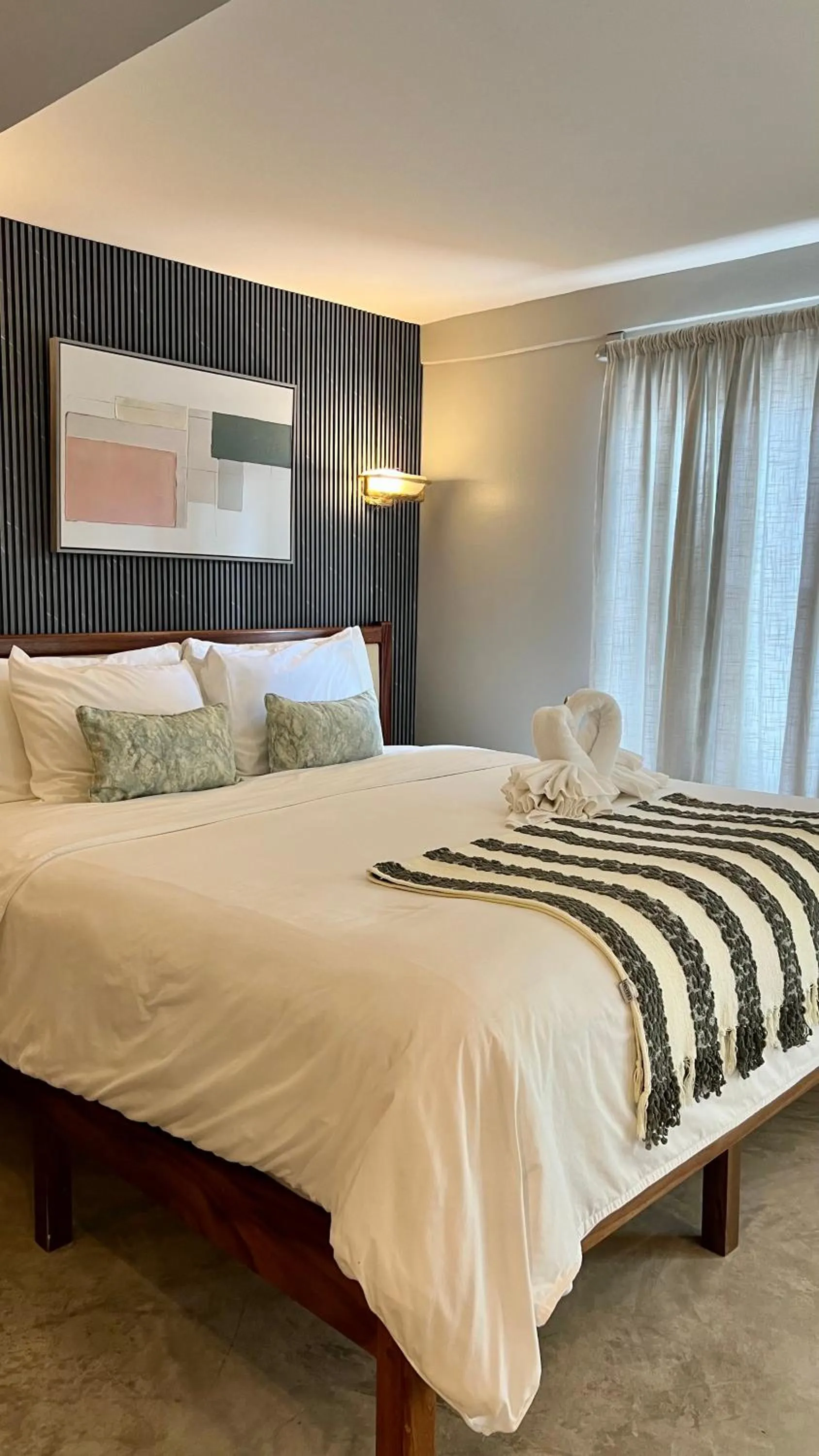 Bed in Mata Rocks Resort