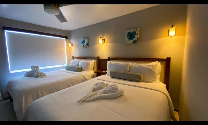 Bed in Mata Rocks Resort