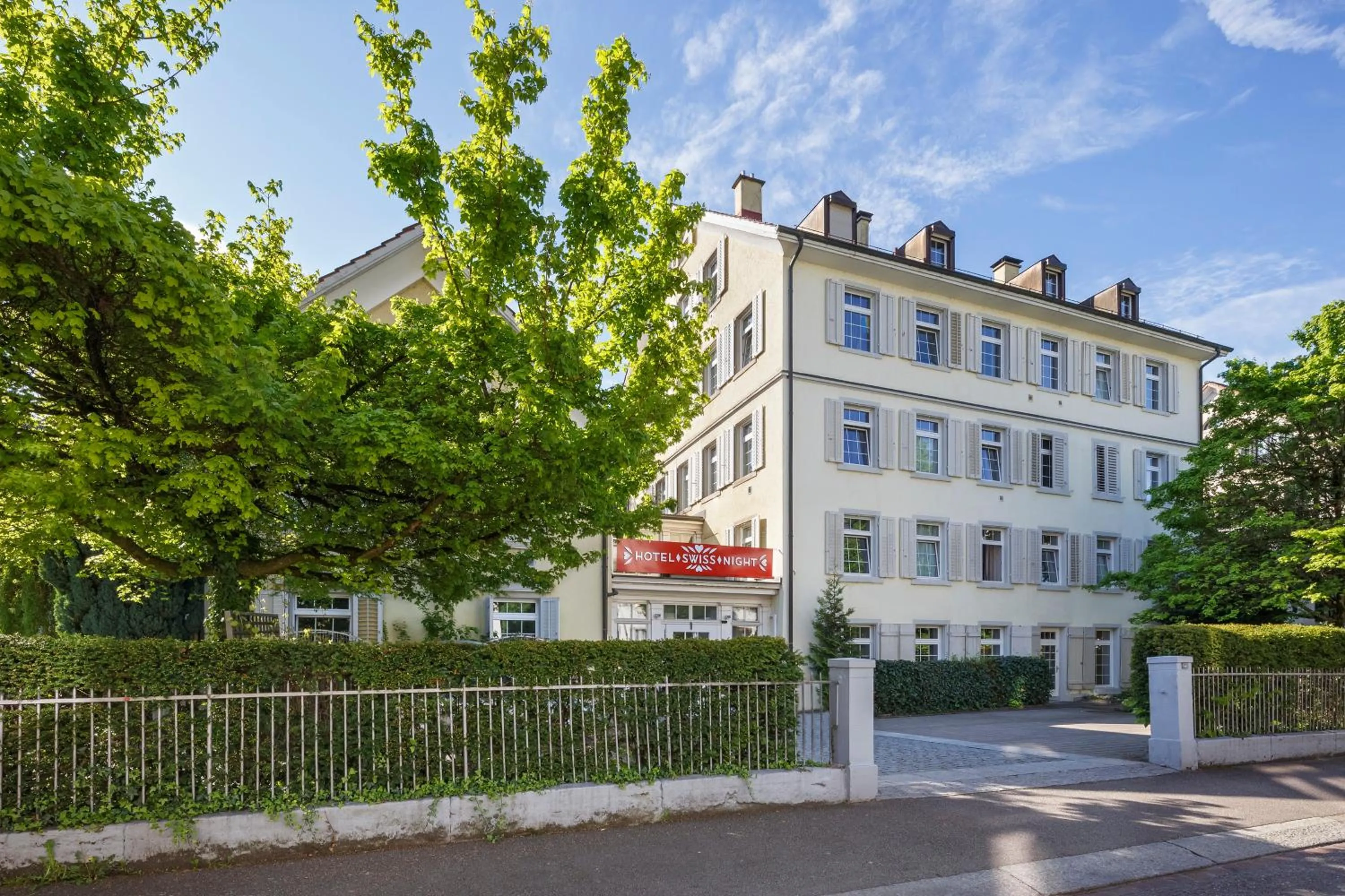 Facade/entrance in Swiss Night by Fassbind