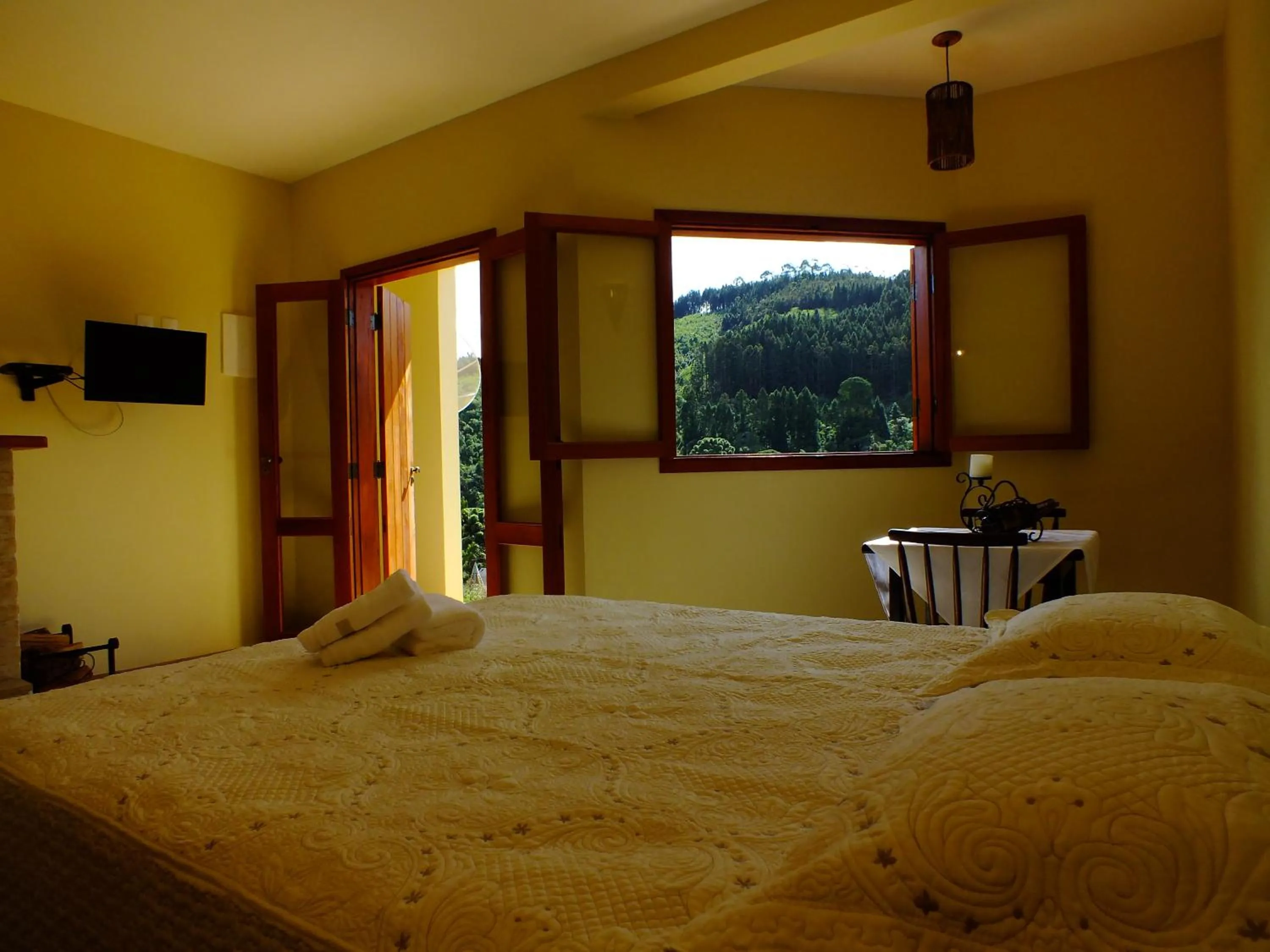 Bed in Pousada Vista da Serra Monte Verde