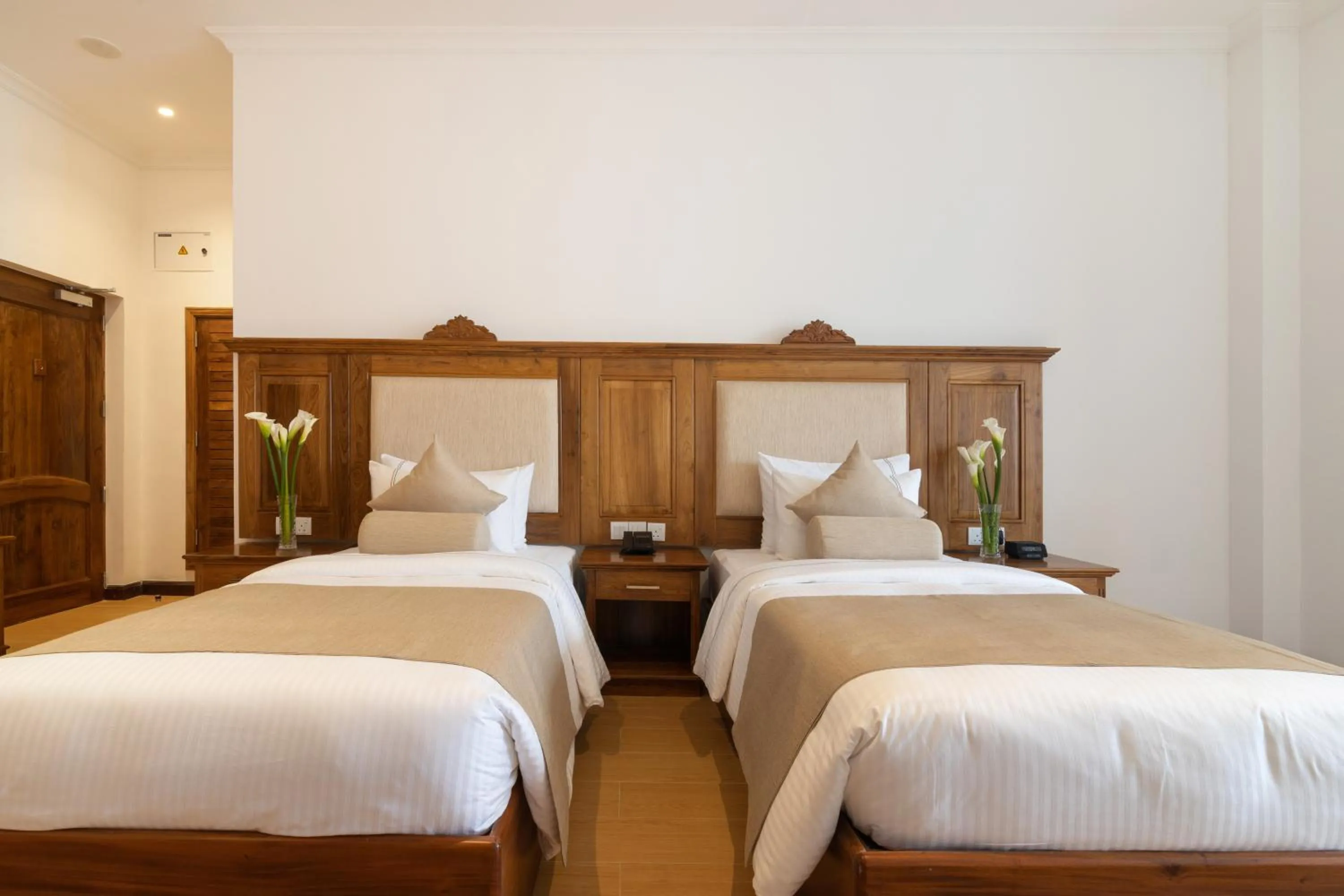 Bedroom, Bed in Araliya Red - Budget friendly Hotel- Where you find stunning 360 panoramic view of Nuwara Eliya