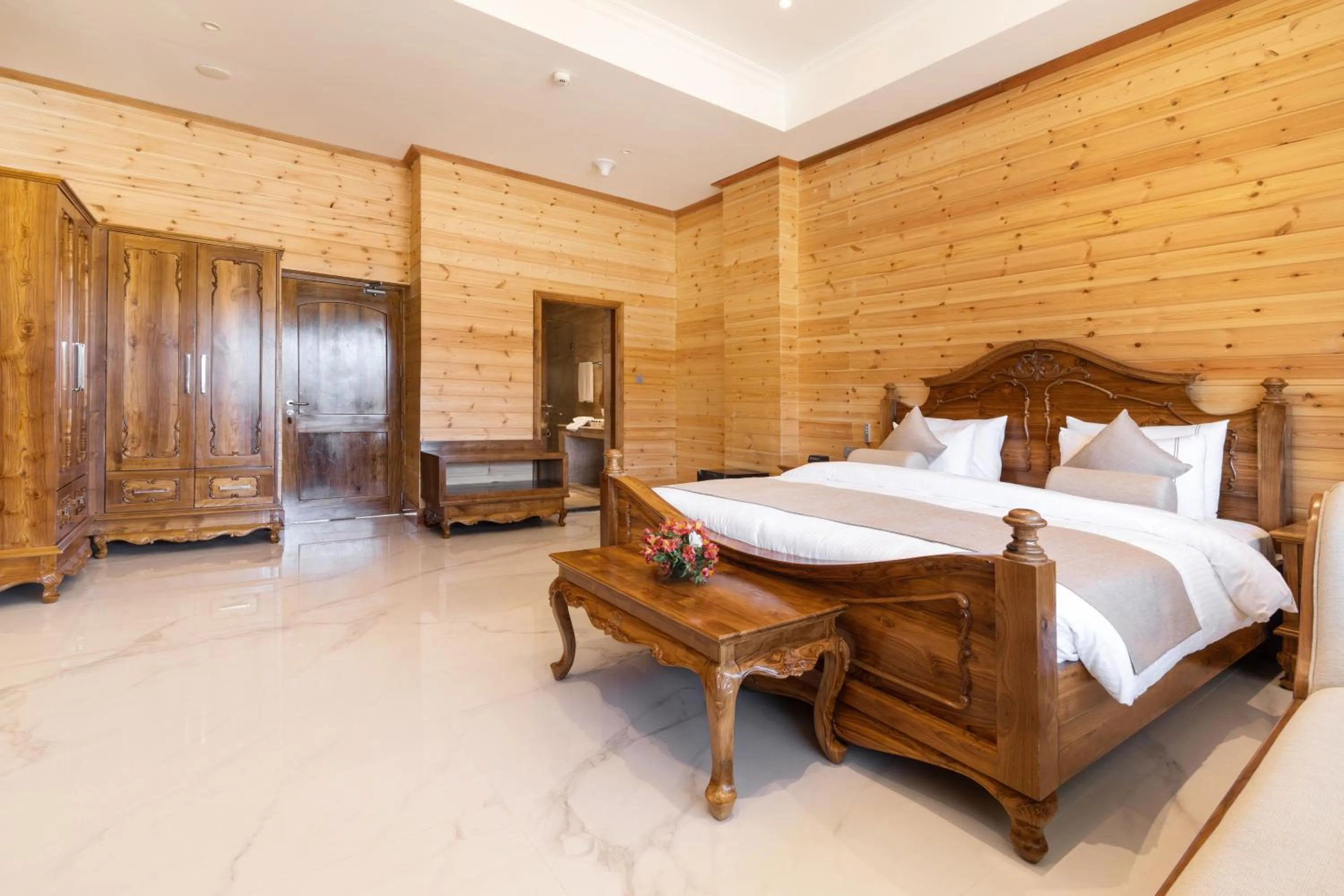 Bed in Araliya Red - Budget friendly Hotel- Where you find stunning 360 panoramic view of Nuwara Eliya