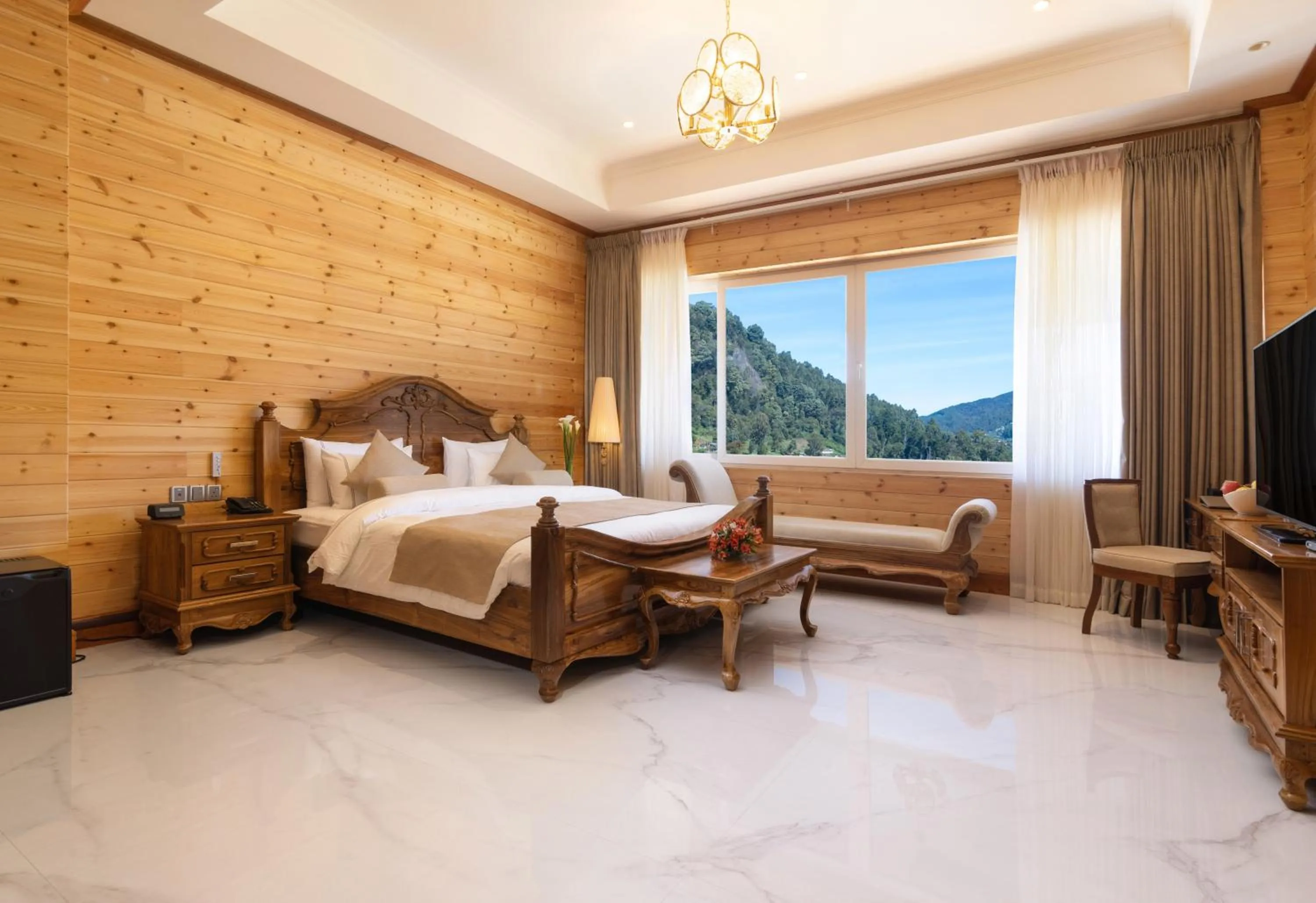 Bed in Araliya Red - Budget friendly Hotel- Where you find stunning 360 panoramic view of Nuwara Eliya