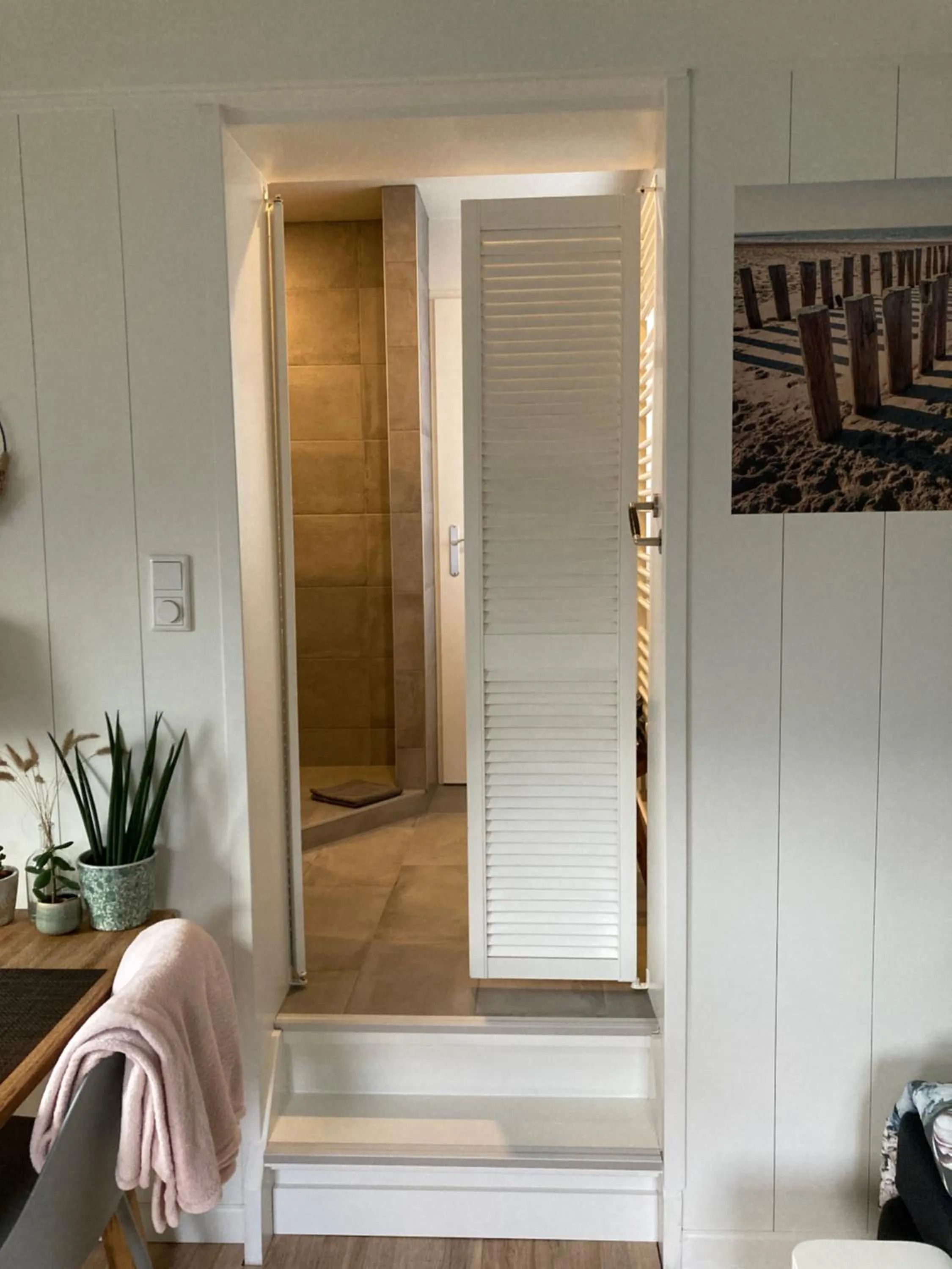 Shower in bed bij zee