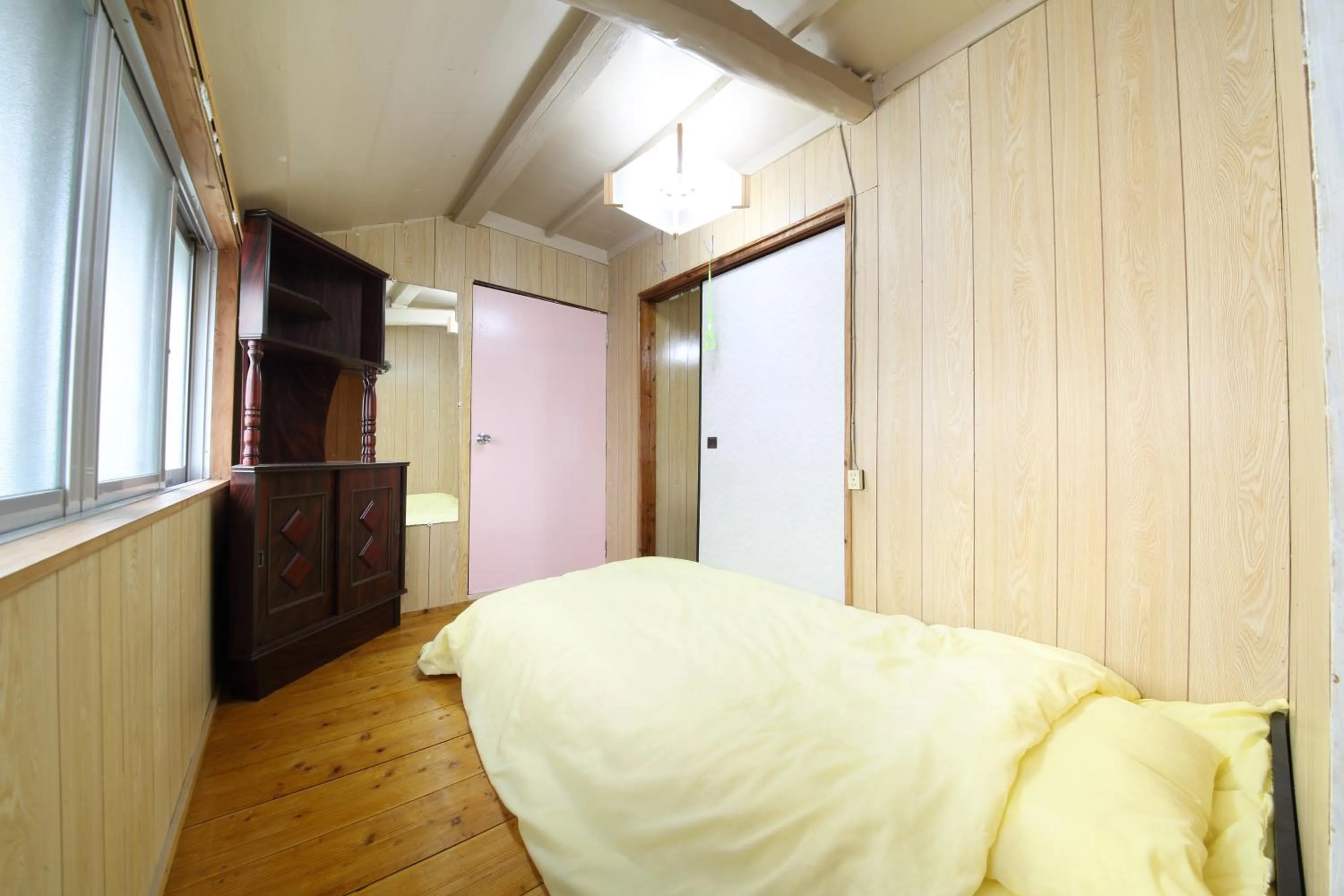 Bed in Kume Azuma Villa