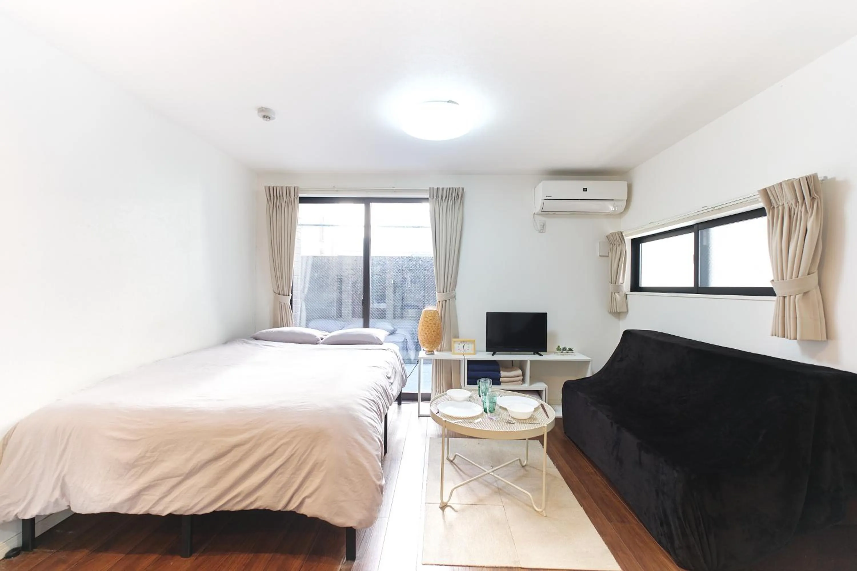 Bed in Base Hanegi Apartment by Tranova