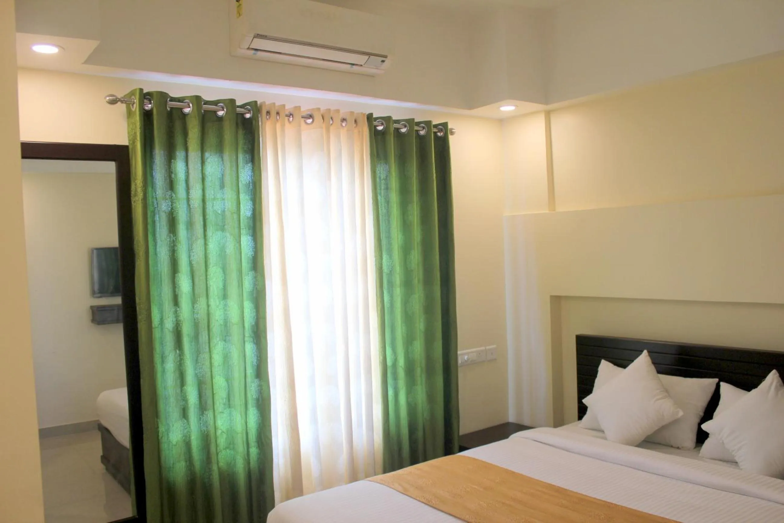 Bed in Aura Residency