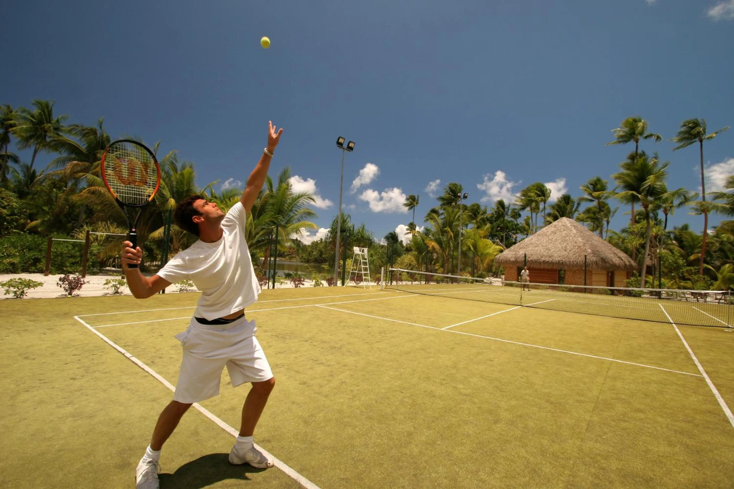 Tennis court in Le Taha'a by Pearl Resorts