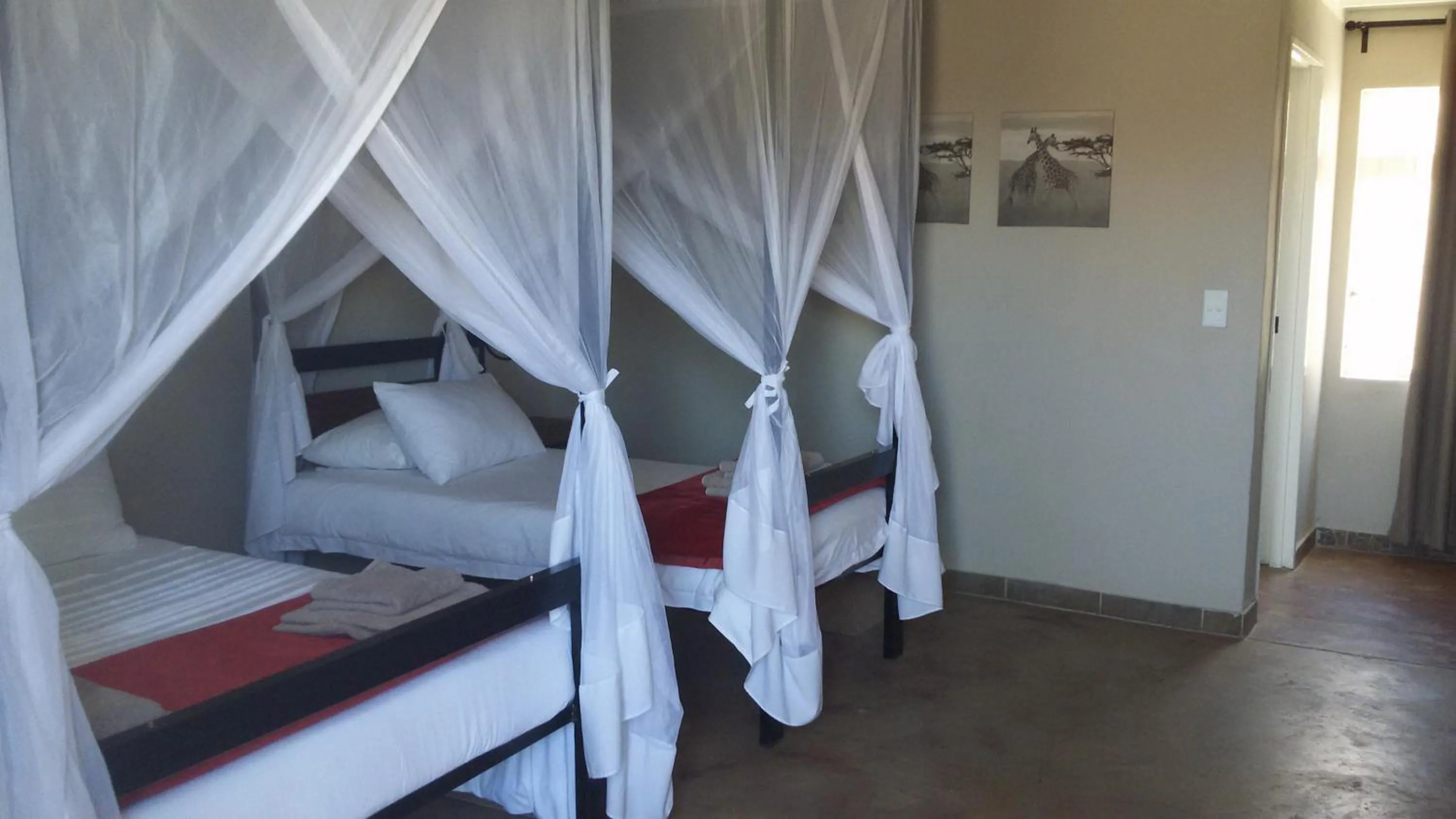 Bed in Etotongwe Lodge