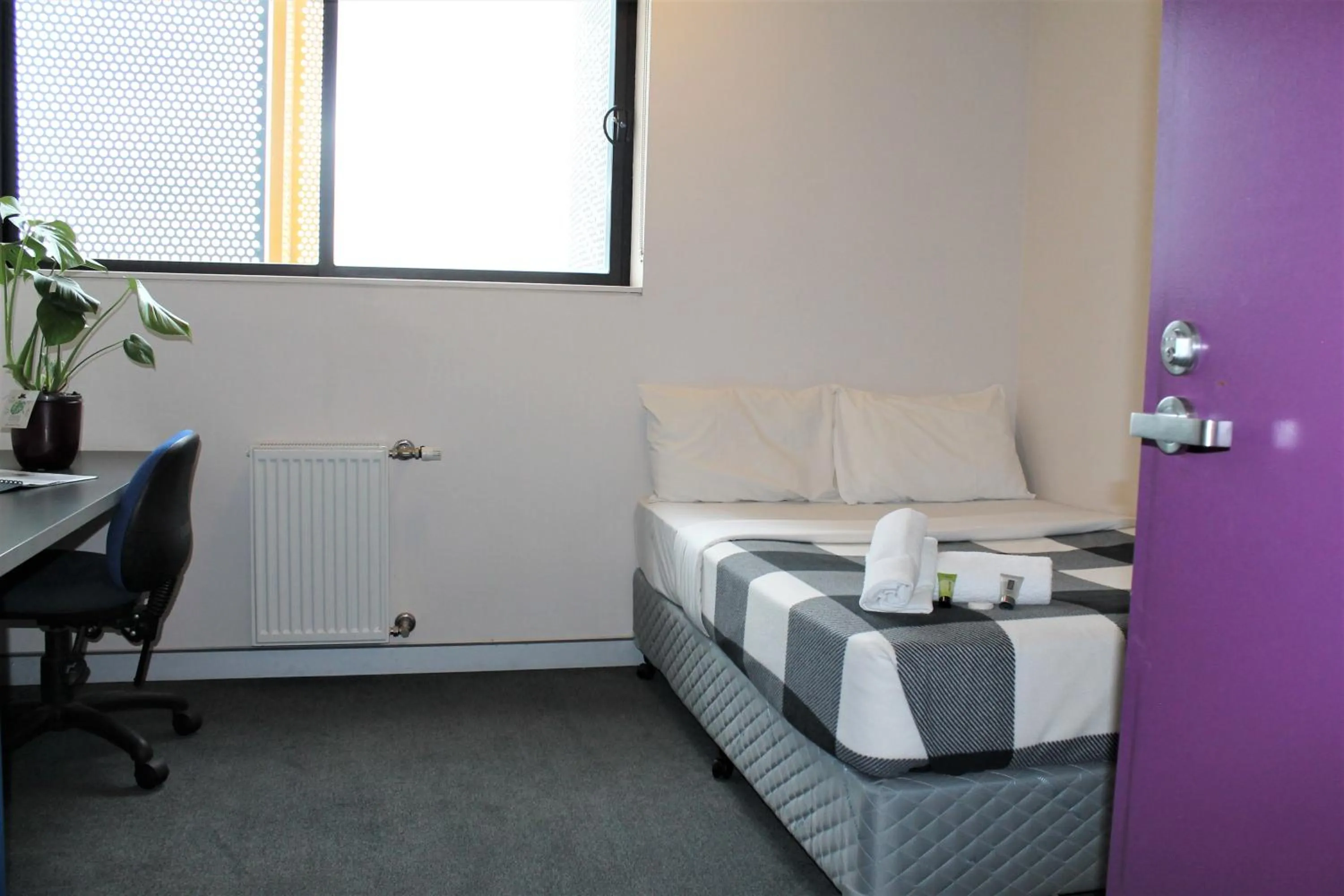 Bed, Seating Area in Western Sydney University Village - Penrith