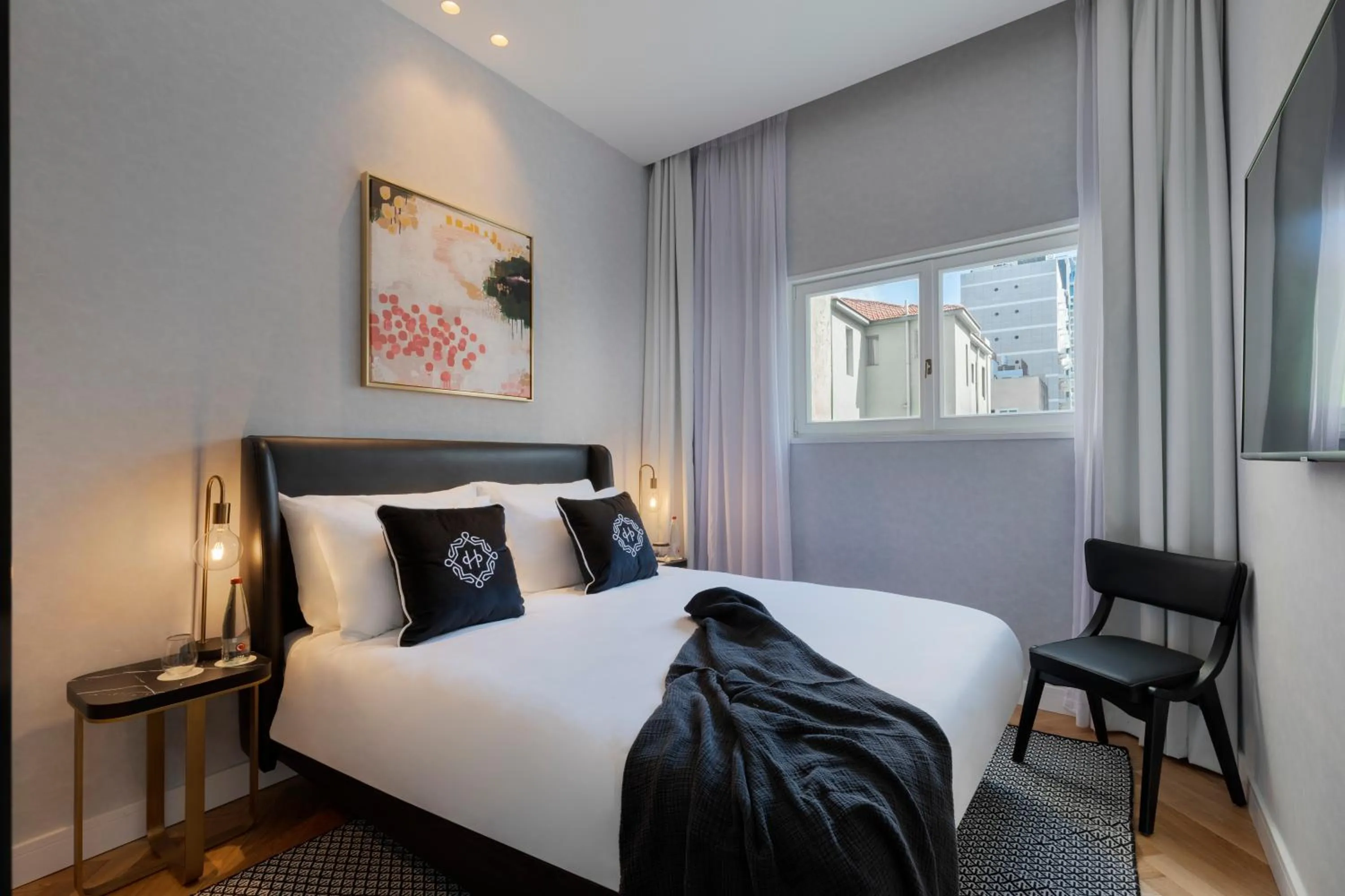 Living room, Bed in The Herbert Tel Aviv