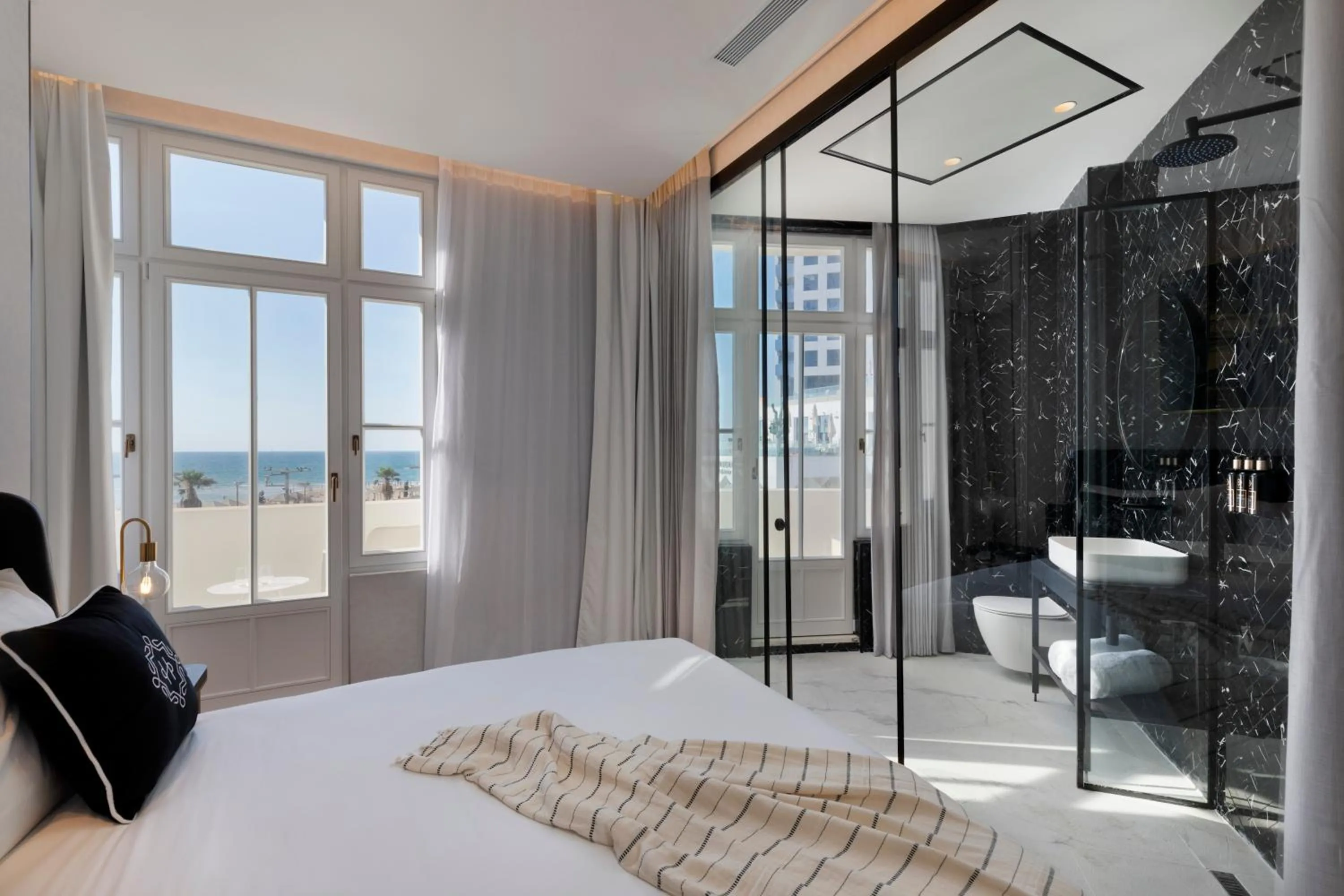 Living room, Bed in The Herbert Tel Aviv