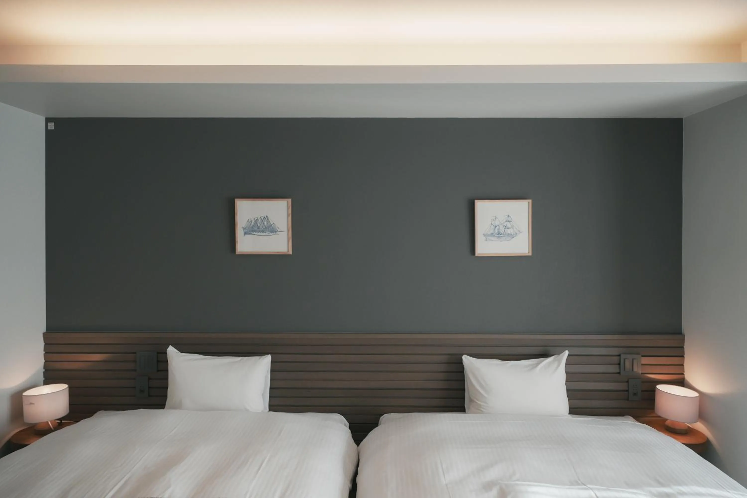 Bed in LAZULI Hiroshima Hotel and Lounge