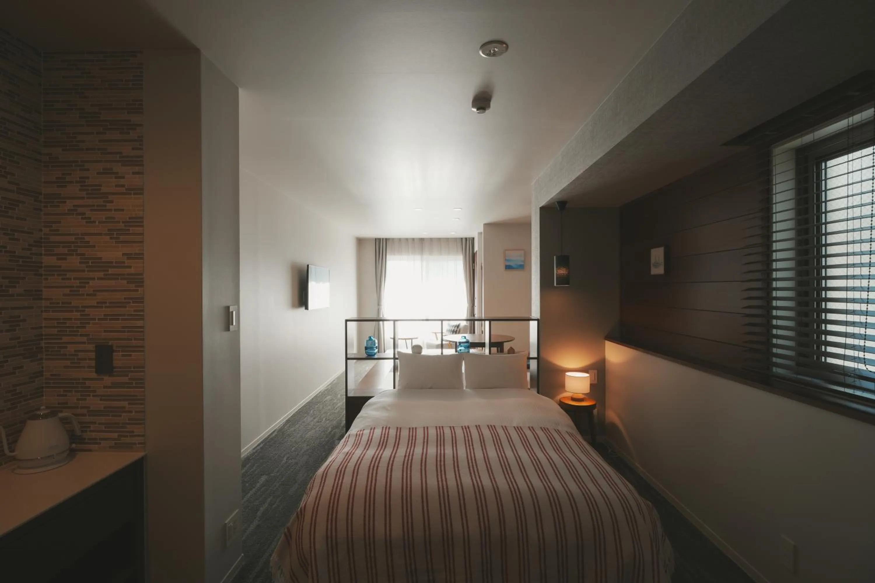 Bed in LAZULI Hiroshima Hotel and Lounge