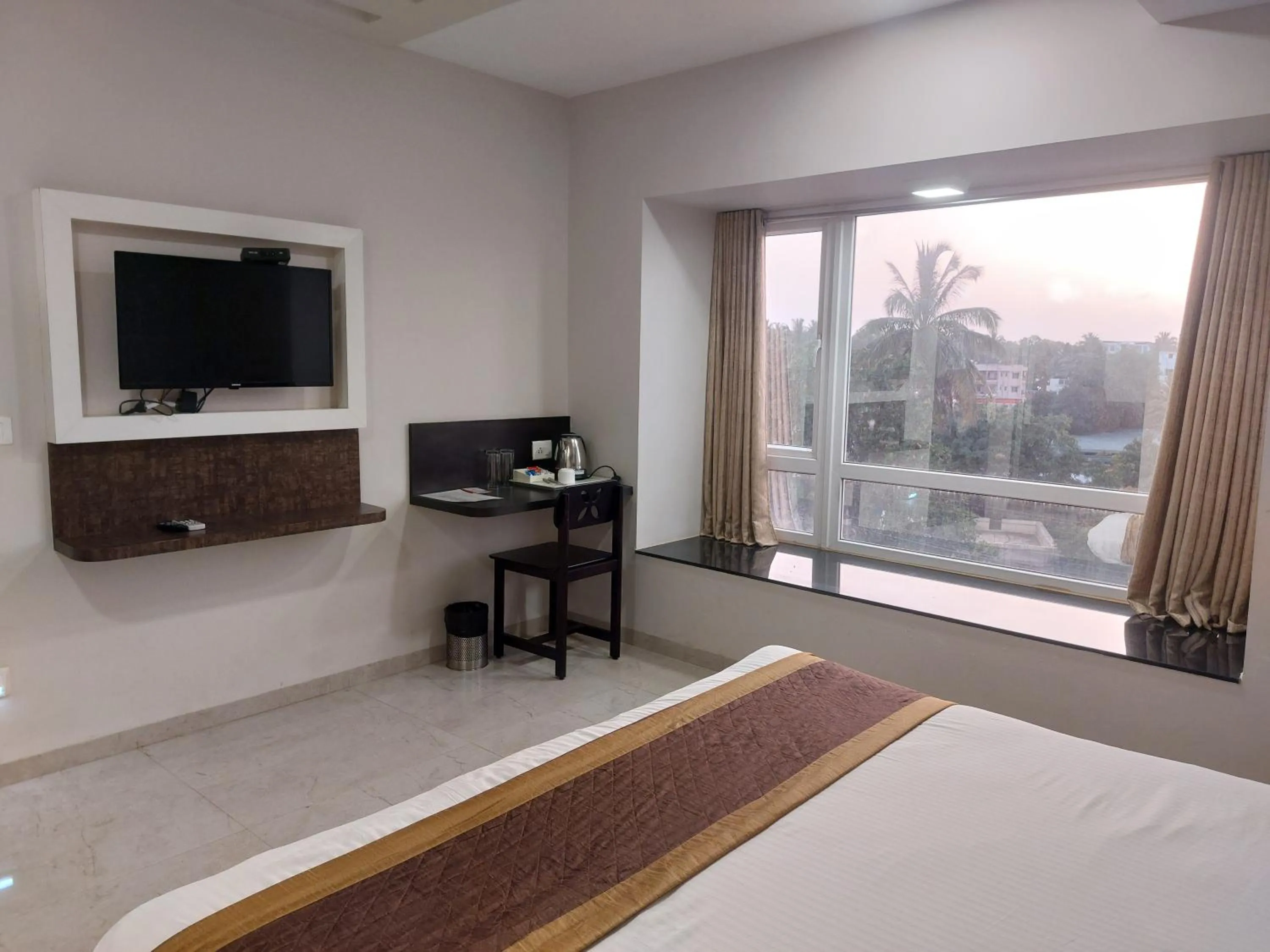 Bed in Hotel Rahul Palace Belgaum