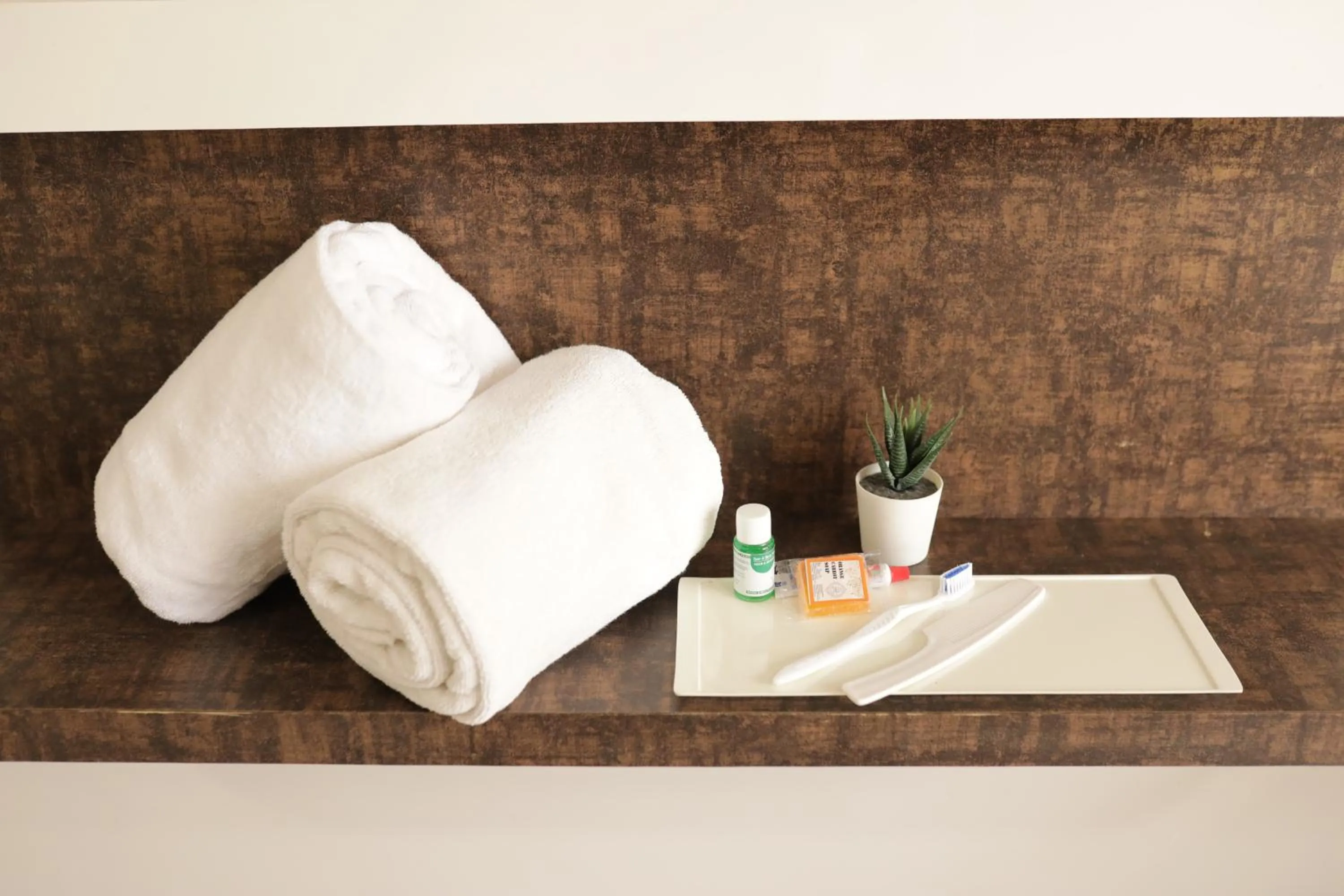 towels, Bed in Hotel Rahul Palace Belgaum