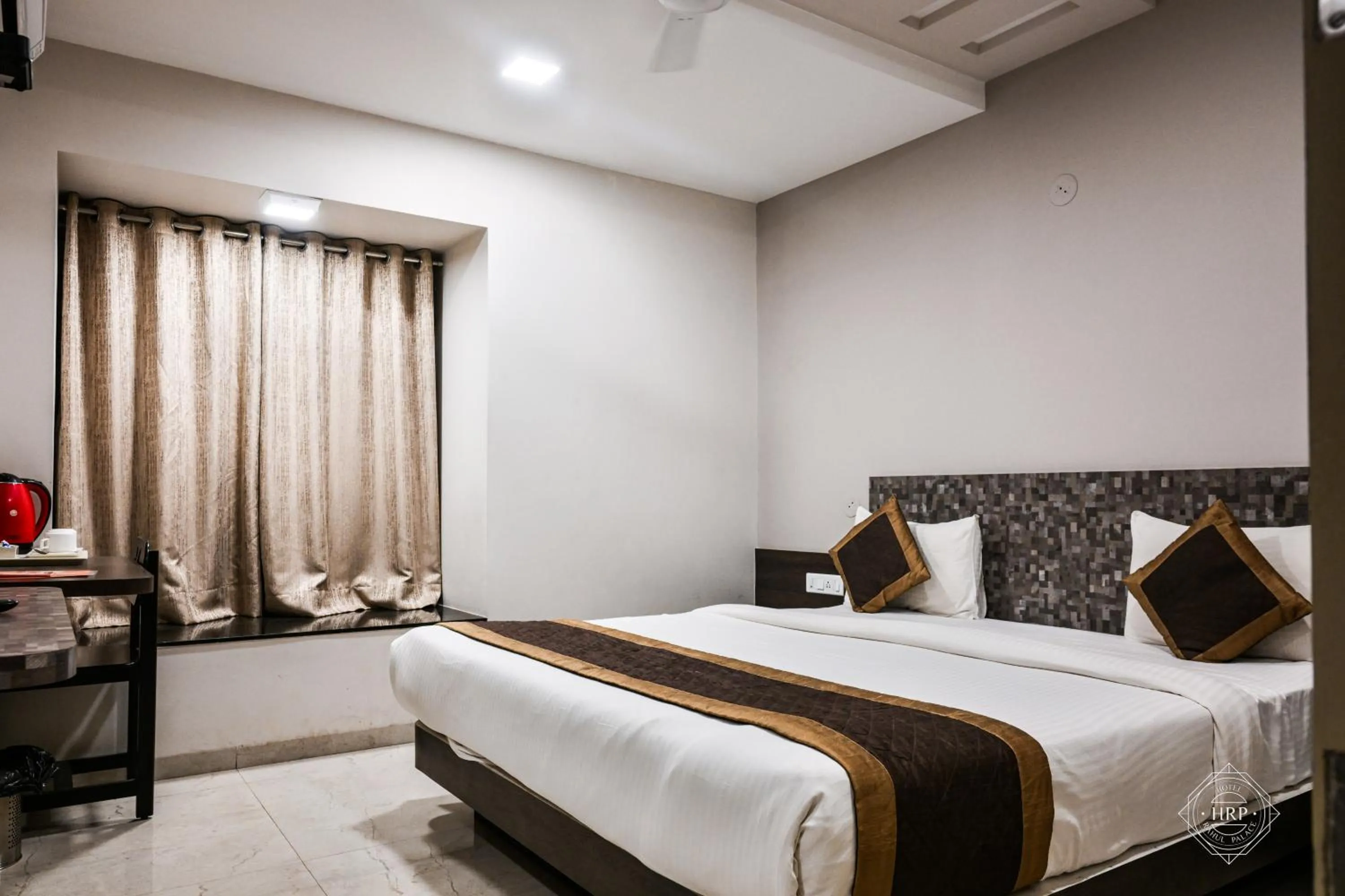 Bed in Hotel Rahul Palace Belgaum